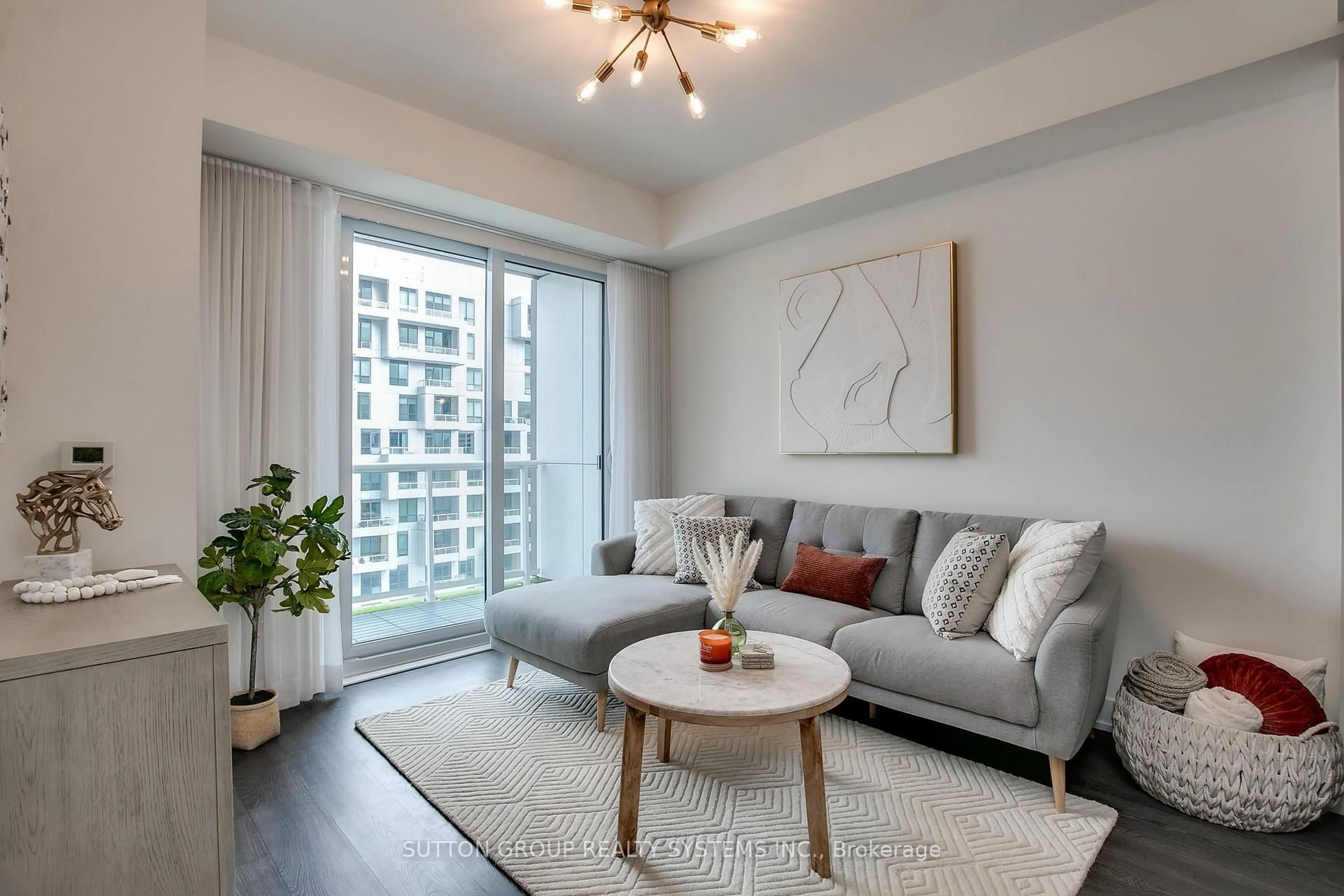 Living room with furniture, unknown for 80 Vanauley St #910, Toronto Ontario M5T 0C9