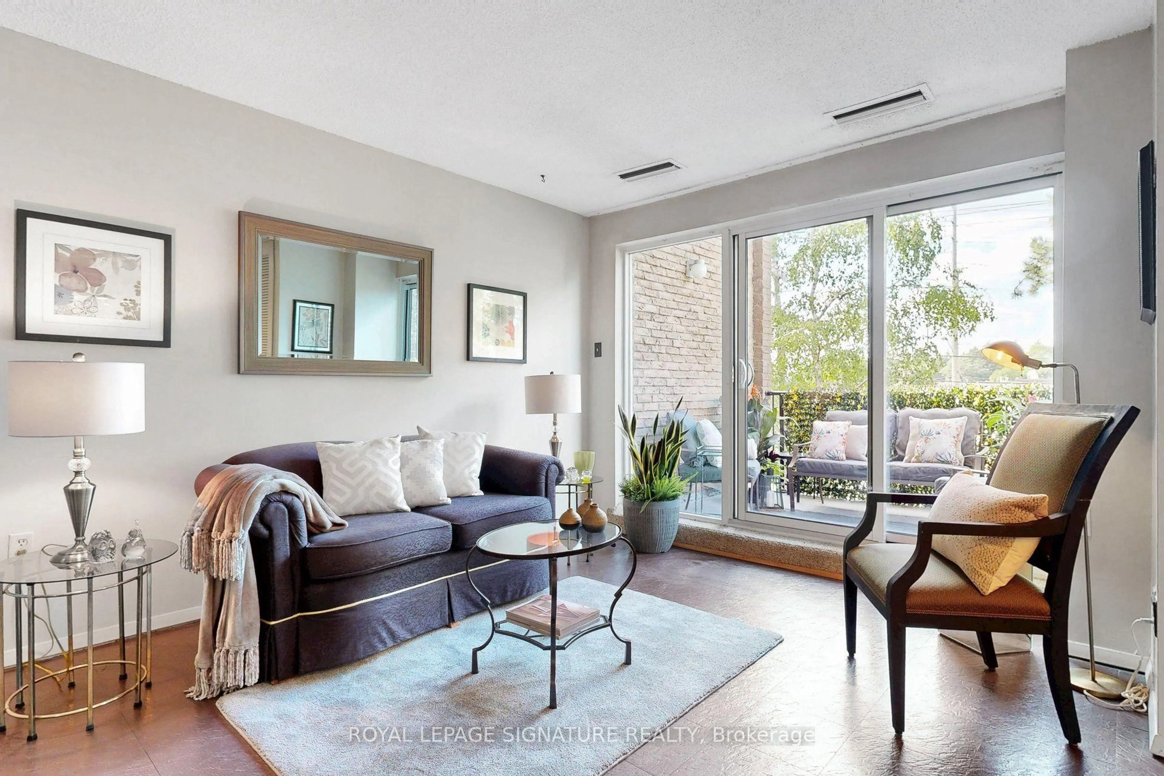 Living room with furniture, unknown for 4005 Don Mills Rd #220, Toronto Ontario M2H 3J9