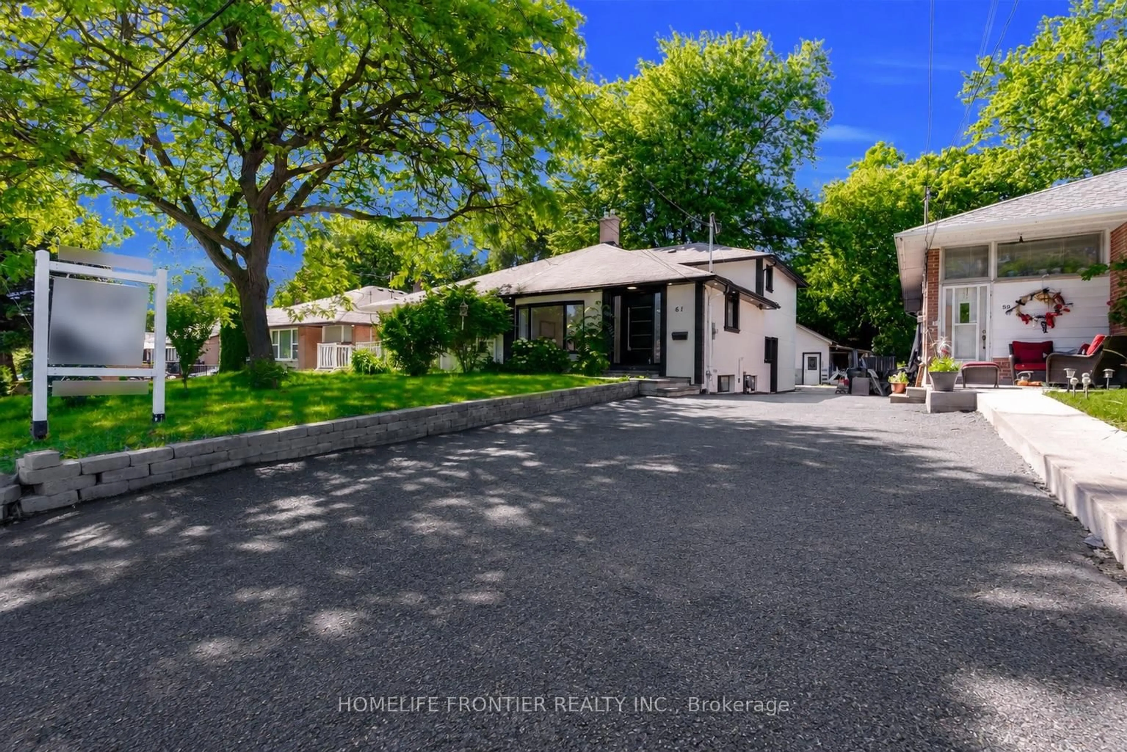 A pic from outside/outdoor area/front of a property/back of a property/a pic from drone, street for 61 Sundial Cres, Toronto Ontario M4A 2J7