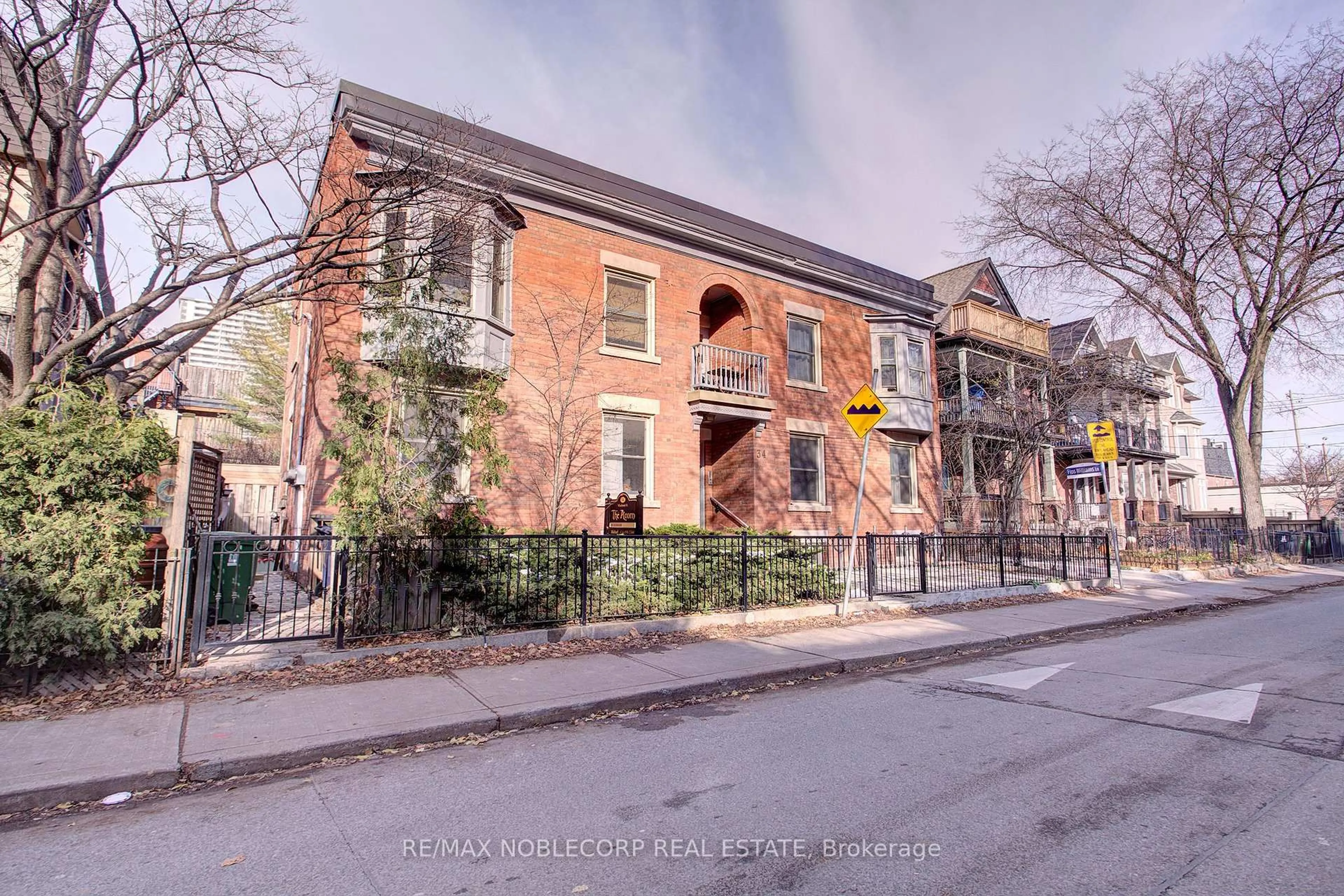 Home with brick exterior material, street for 34 Winchester St, Toronto Ontario M4X 1A7