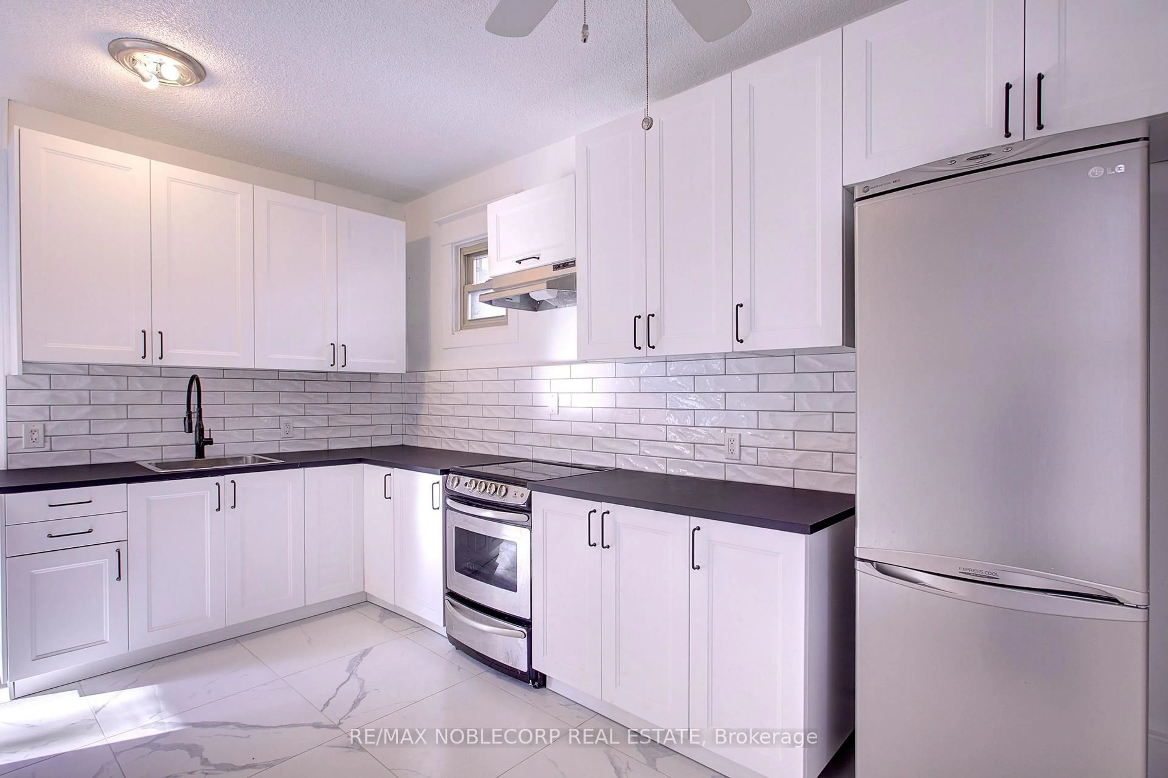 Standard kitchen, ceramic/tile floor for 34 Winchester St, Toronto Ontario M4X 1A7