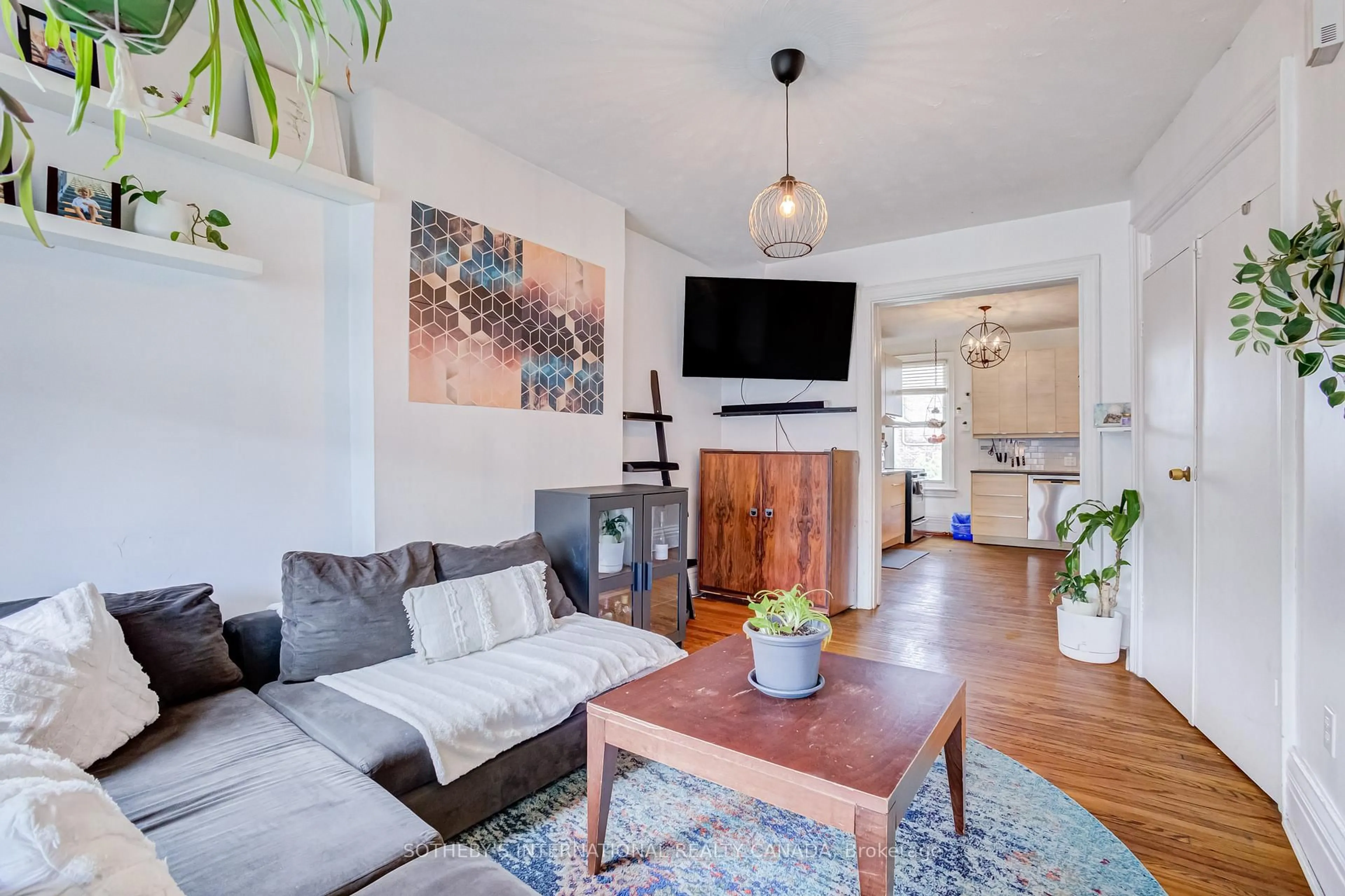 Living room with furniture, unknown for 1213 College St, Toronto Ontario M6H 1C1