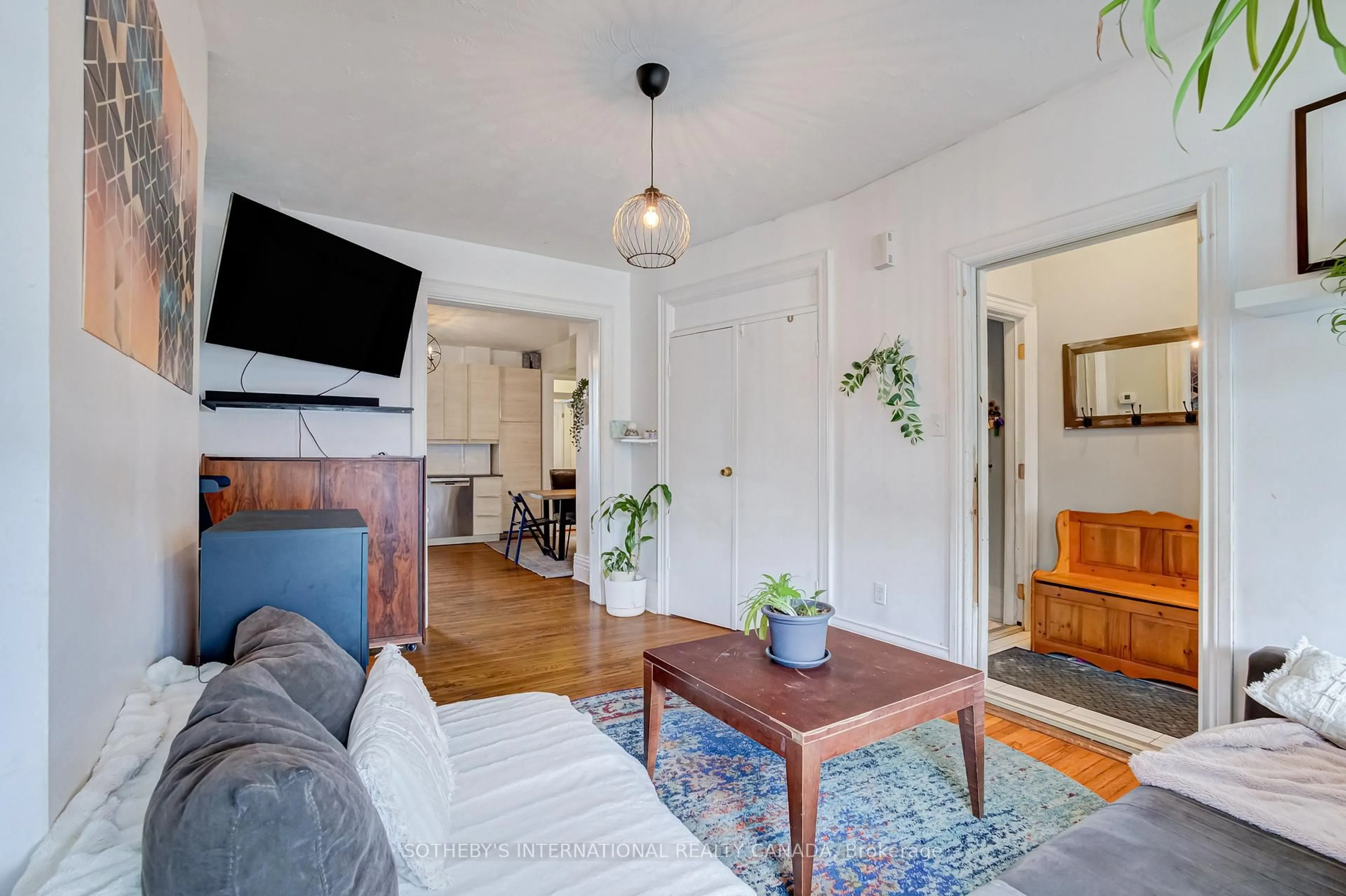 Living room with furniture, unknown for 1213 College St, Toronto Ontario M6H 1C1