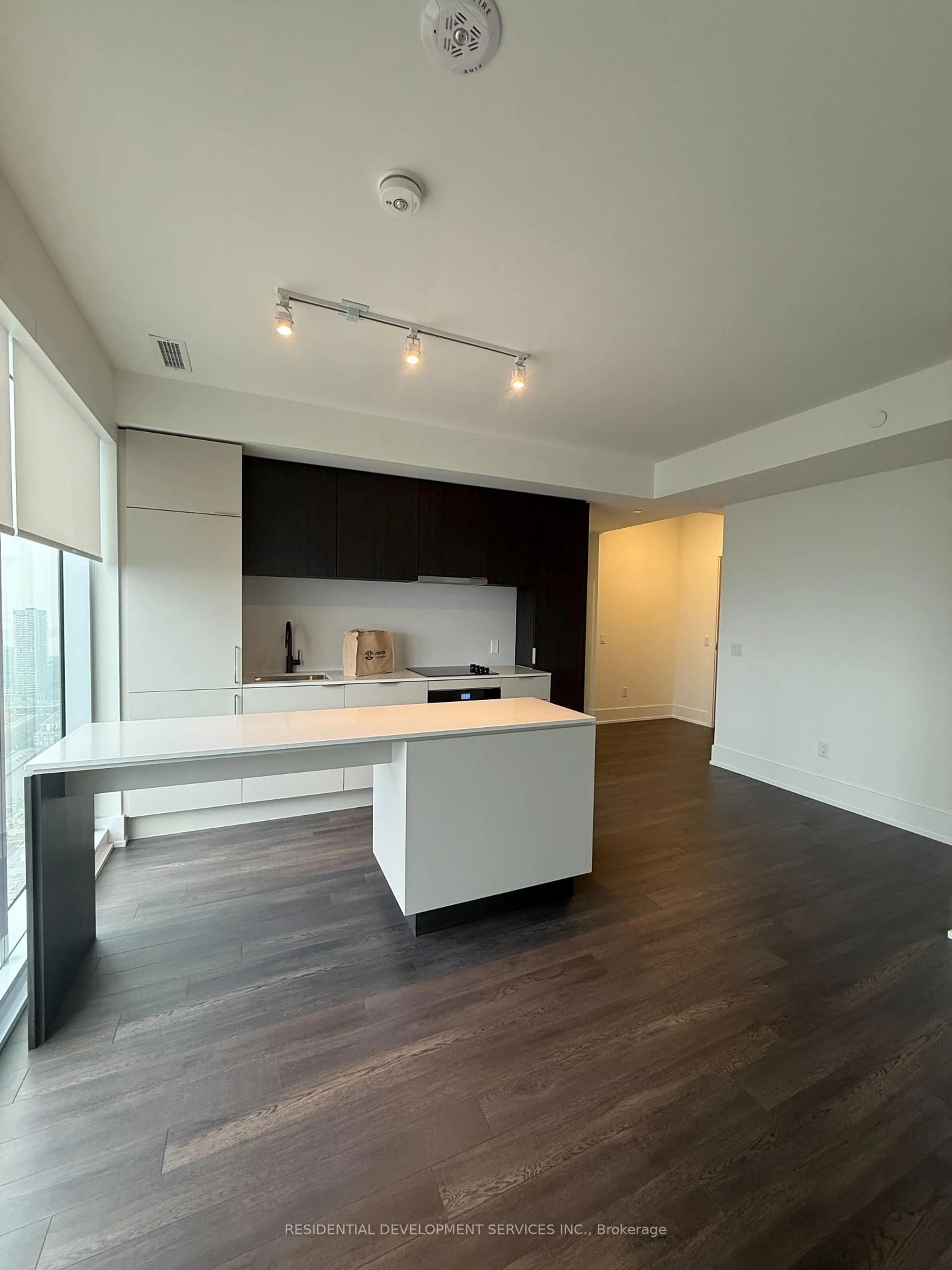 Open concept kitchen, wood/laminate floor for 89 Church St #4806, Toronto Ontario M5C 0B7