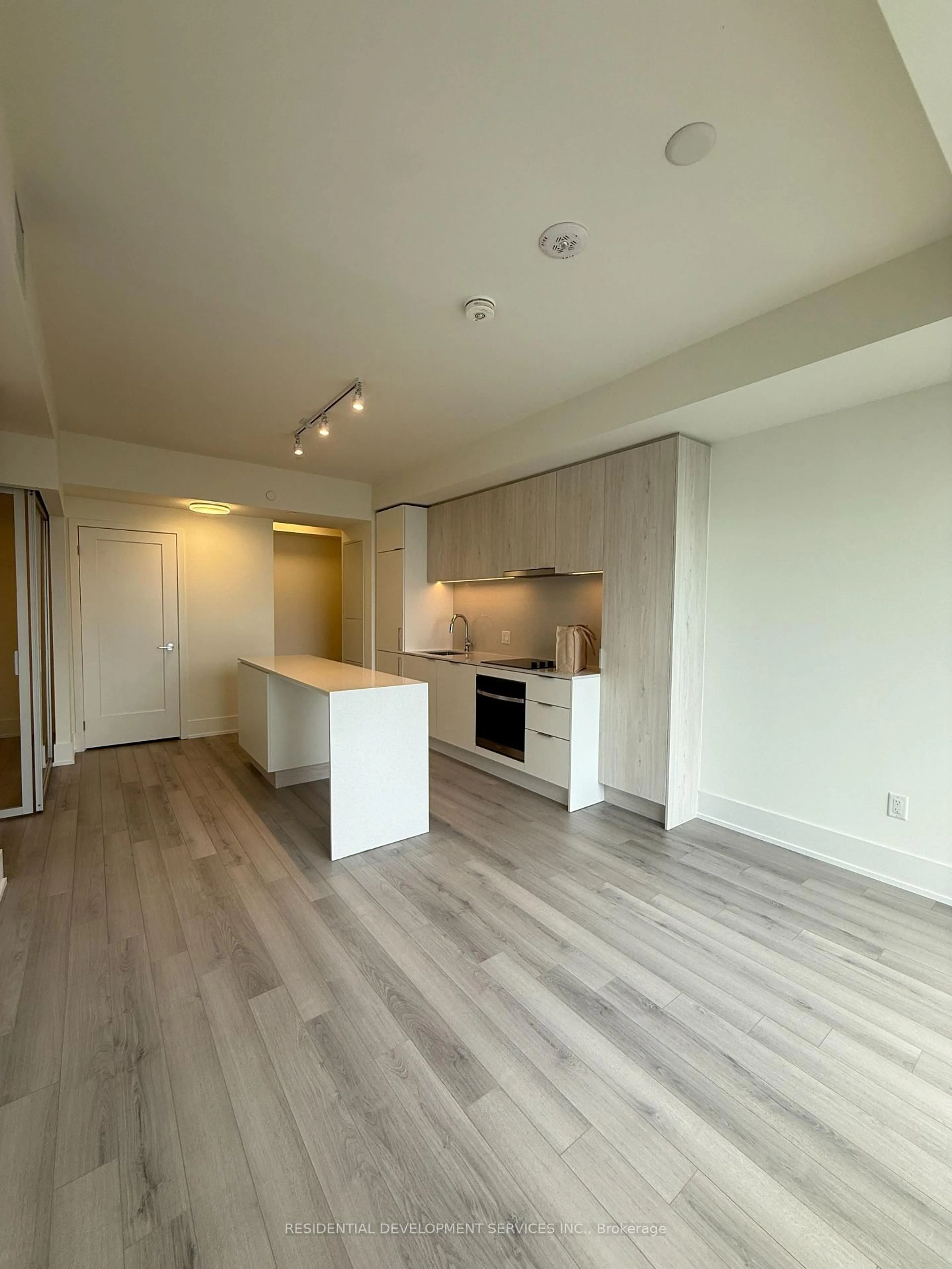 Open concept kitchen, wood/laminate floor for 89 Church St #4604, Toronto Ontario M5C 0B7