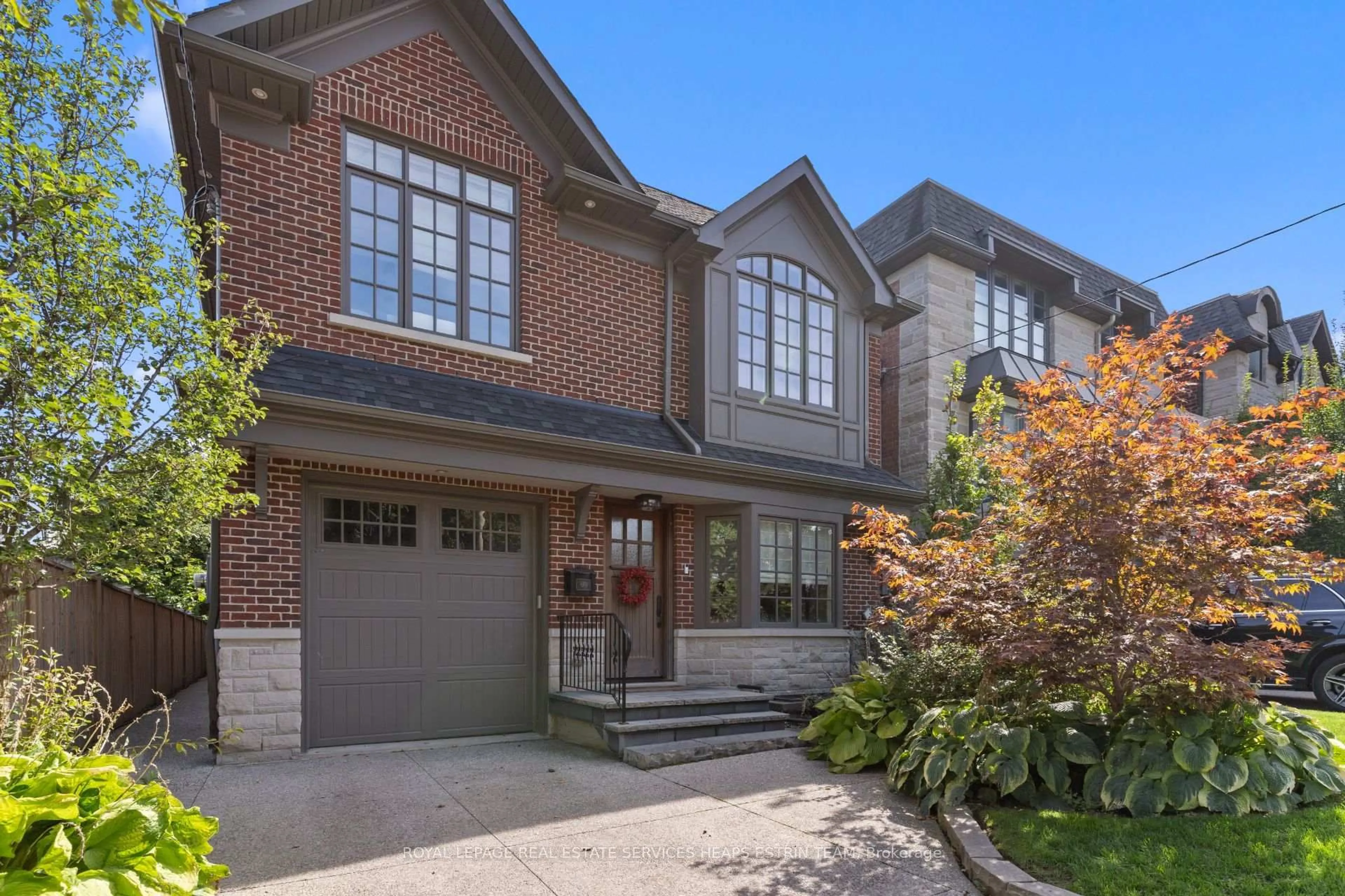 Home with brick exterior material, street for 151 Sutherland Dr, Toronto Ontario M4G 1H8