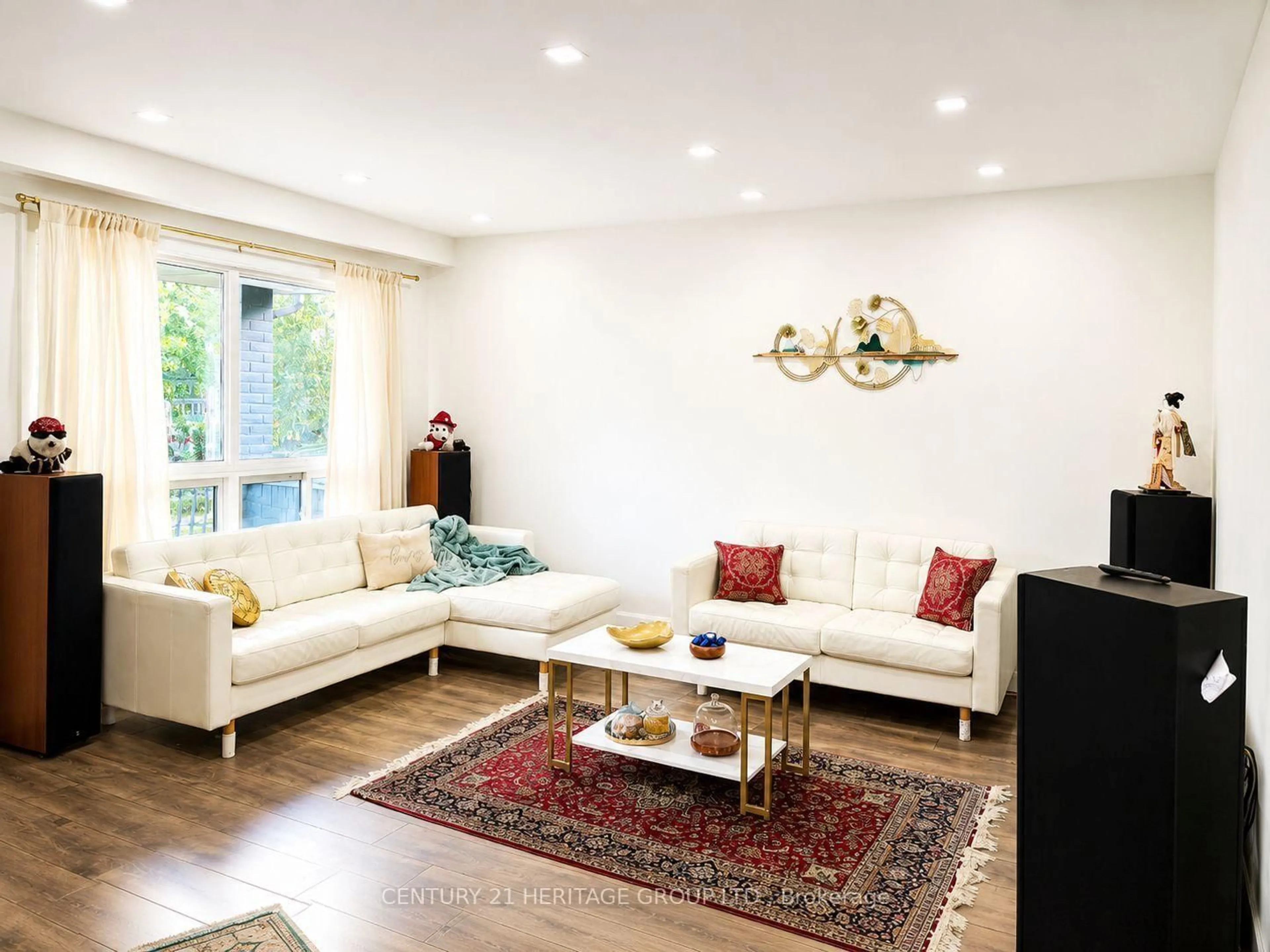 Living room with furniture, wood/laminate floor for 124 Regina Ave, Toronto Ontario M6A 1R7