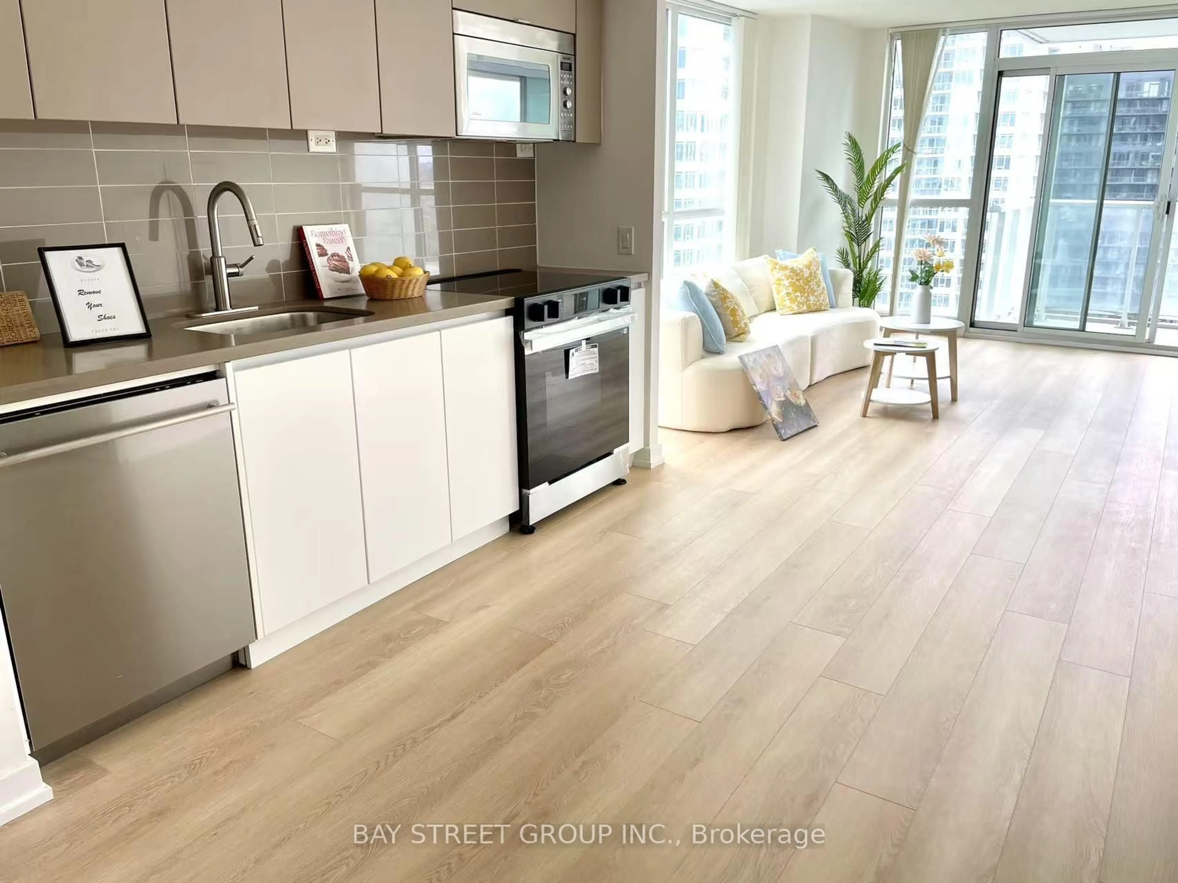 Open concept kitchen, wood/laminate floor for 75 Queens Wharf Rd #2908, Toronto Ontario M5V 0J8