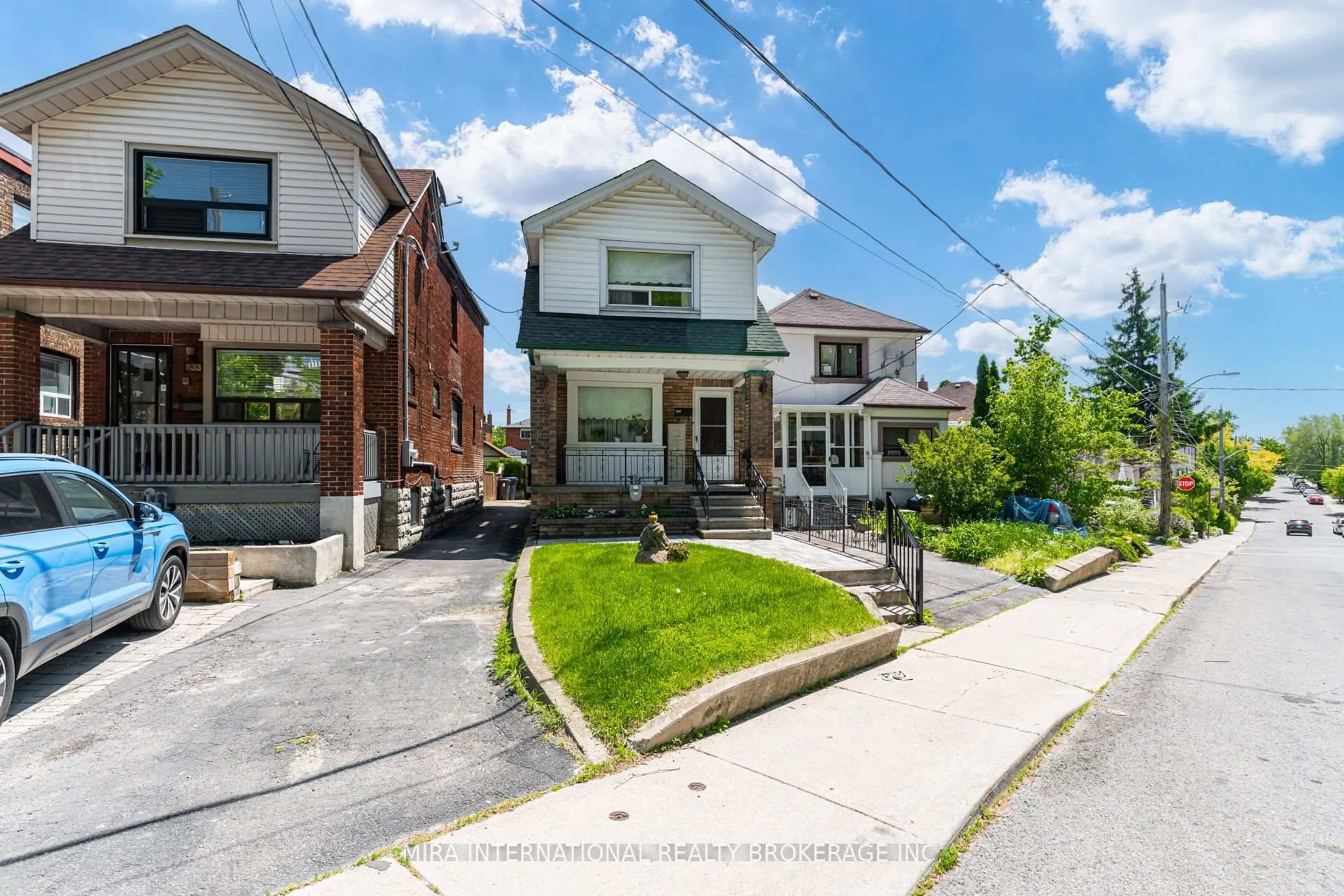 Home with brick exterior material, street for 631 Lauder Ave, Toronto Ontario M6E 3J8