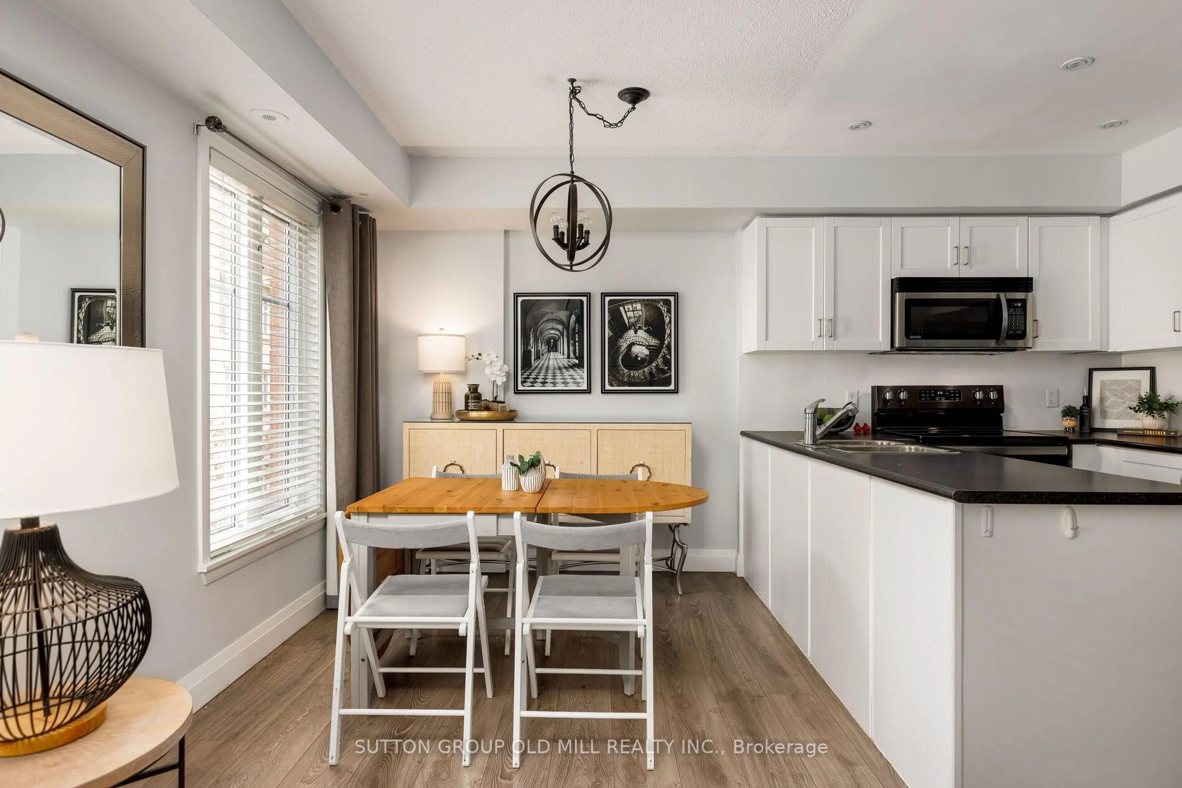 Open concept kitchen, wood/laminate floor for 46 Western Battery Rd #809, Toronto Ontario M6K 3P1