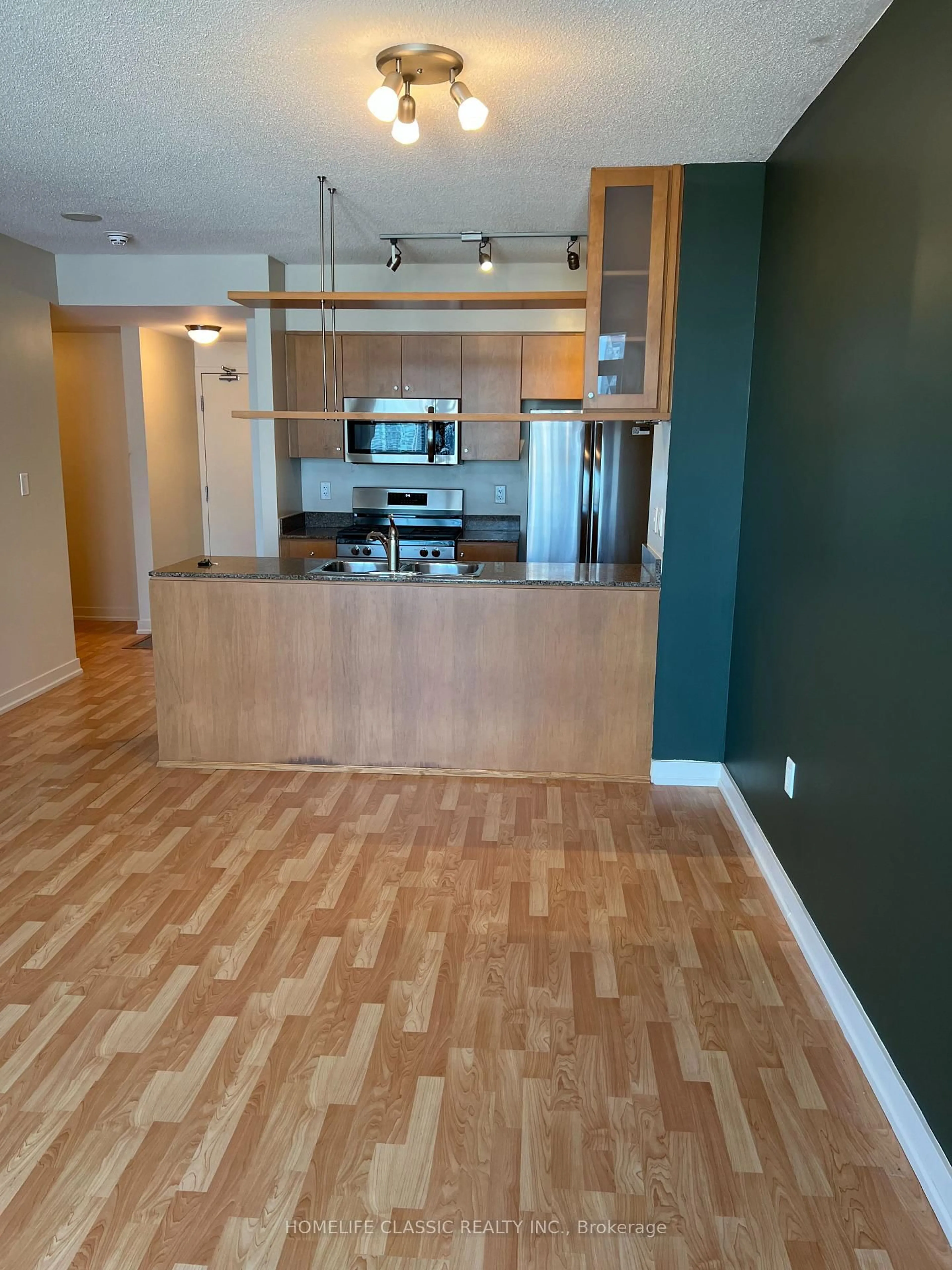 Open concept kitchen, wood/laminate floor for 10 Navy Wharf Crt #3508, Toronto Ontario M5V 3V2