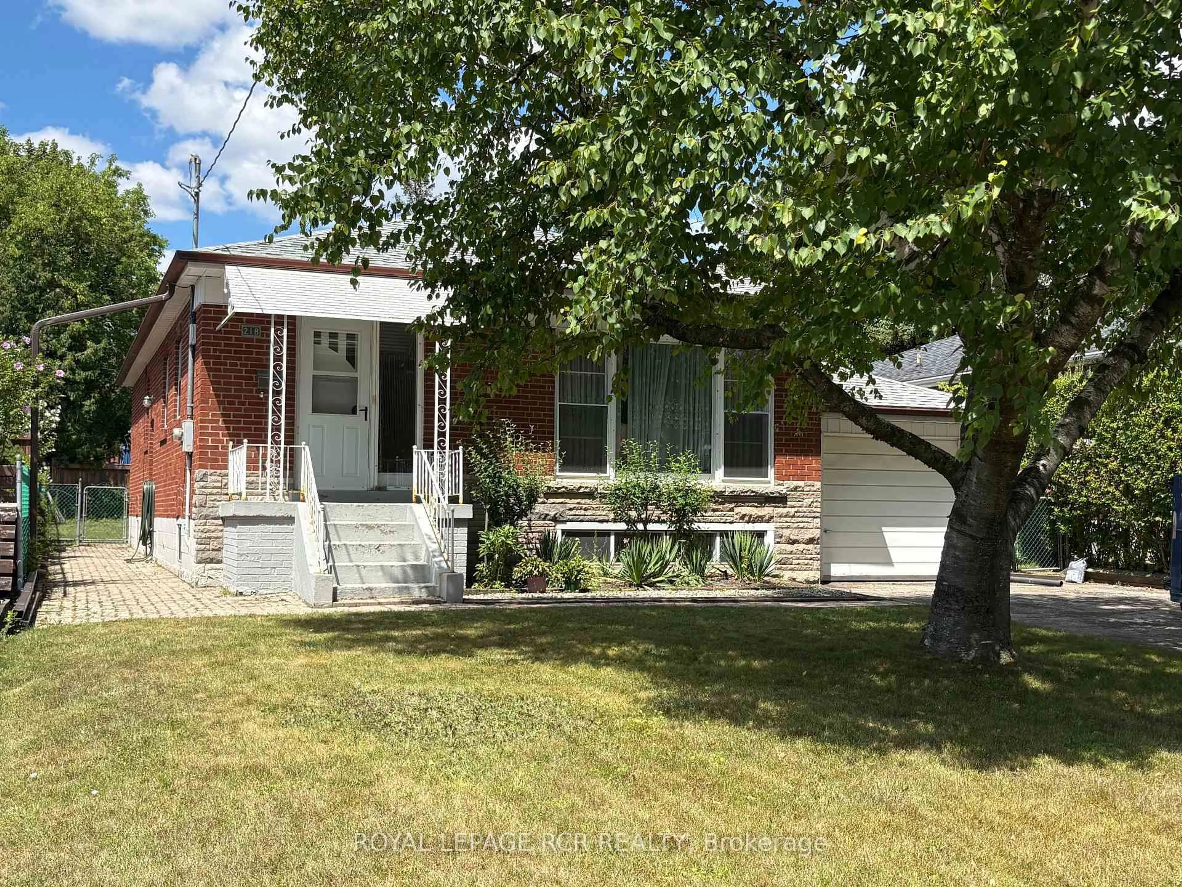 Home with brick exterior material, street for 218 Park Home Ave, Toronto Ontario M2R 1A2
