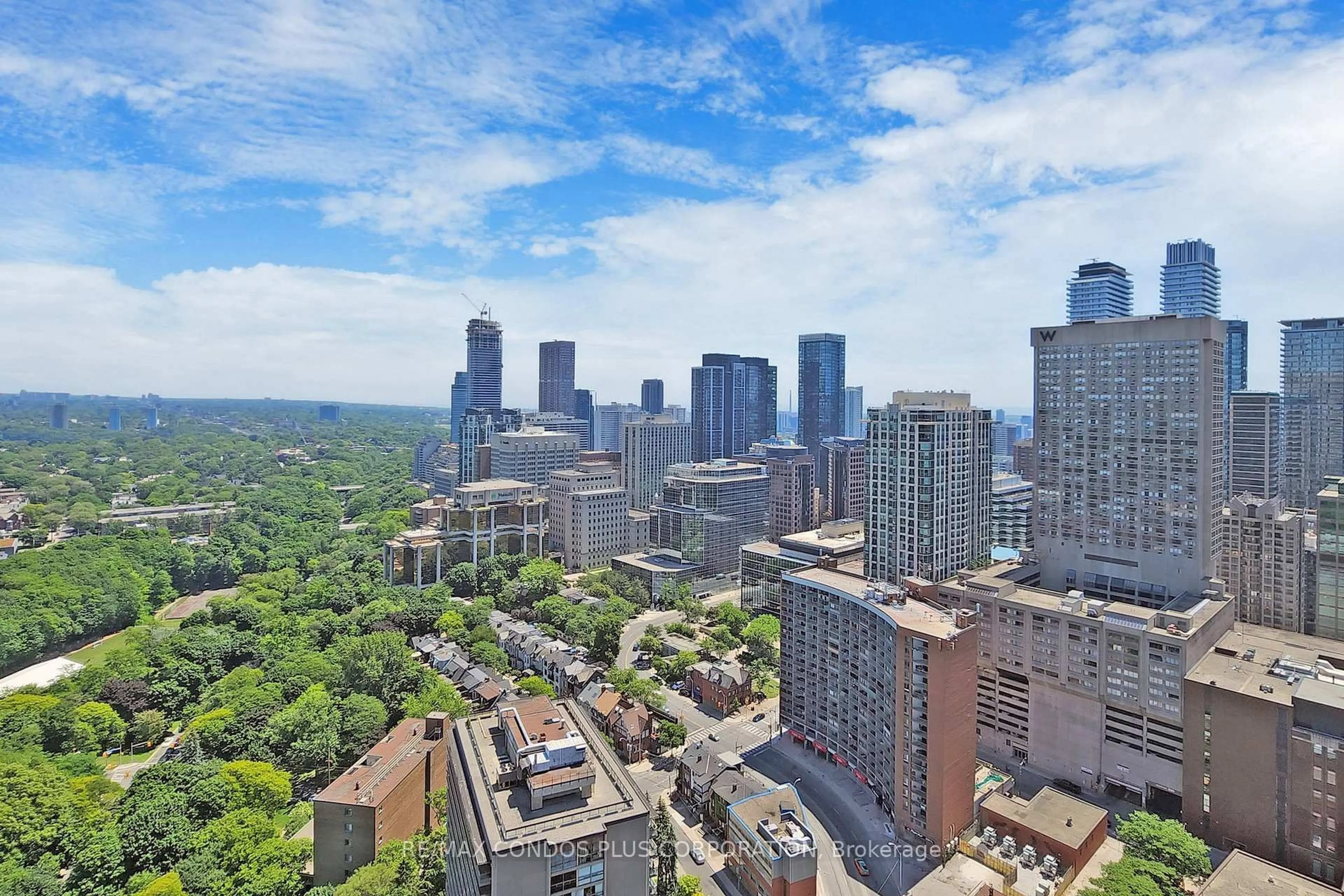 A pic from outside/outdoor area/front of a property/back of a property/a pic from drone, city buildings view from balcony for 825 Church St #3807, Toronto Ontario M4W 3Z4