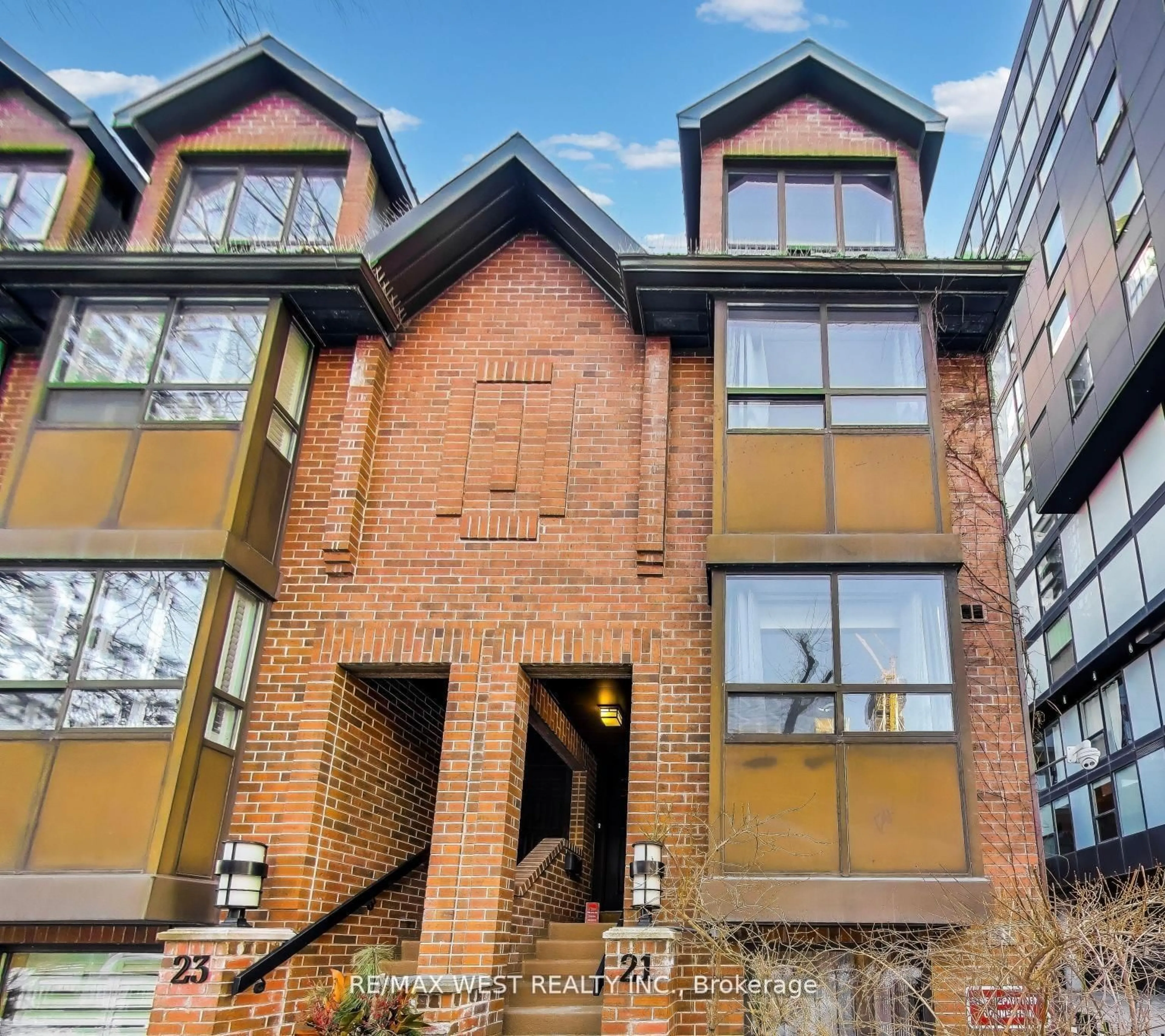 Home with brick exterior material, building for 21 Dundonald St, Toronto Ontario M4Y 1K3