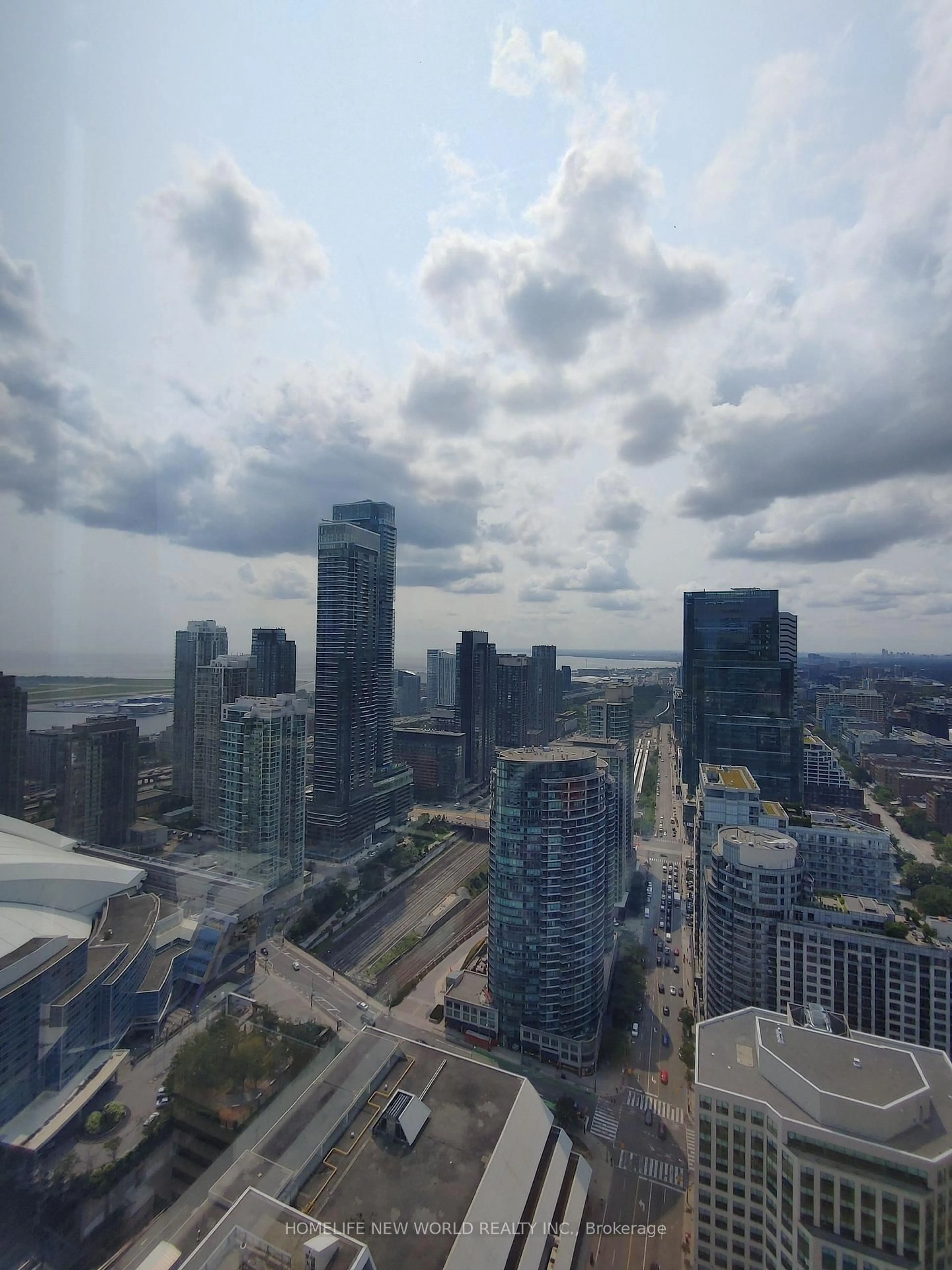 A pic from outside/outdoor area/front of a property/back of a property/a pic from drone, city buildings view from balcony for 300 Front St #4406, Toronto Ontario M5V 0E9