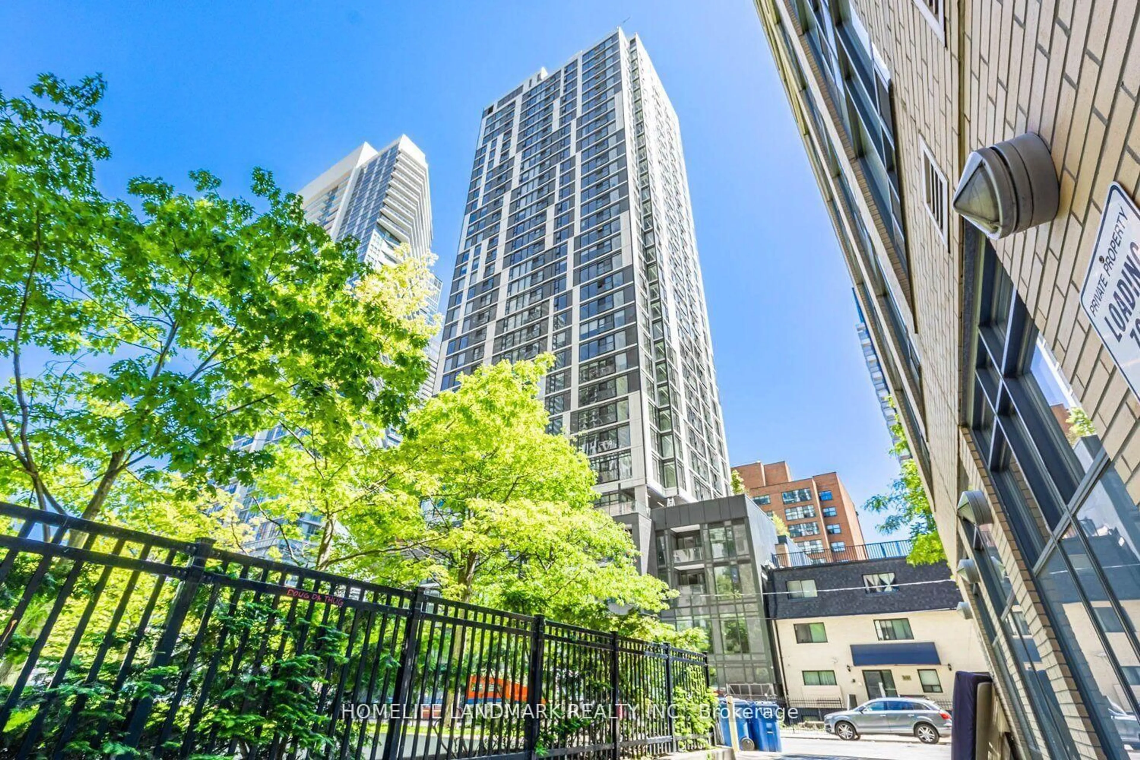 Patio, city buildings view from balcony for 65 Mutual St #2301, Toronto Ontario M5B 2A9