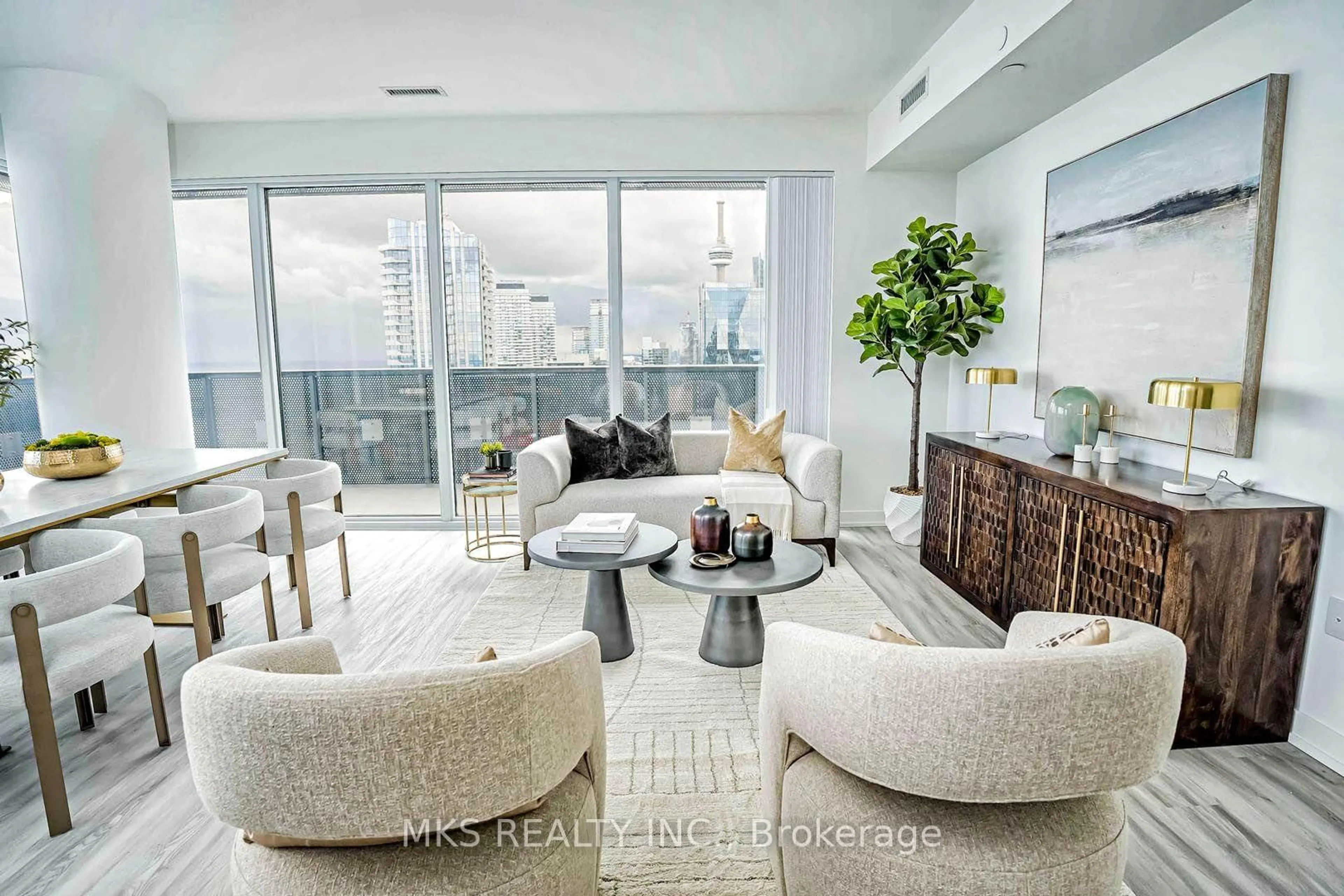 Living room with furniture, unknown for 55 Cooper St #7711, Toronto Ontario M5E 0G1