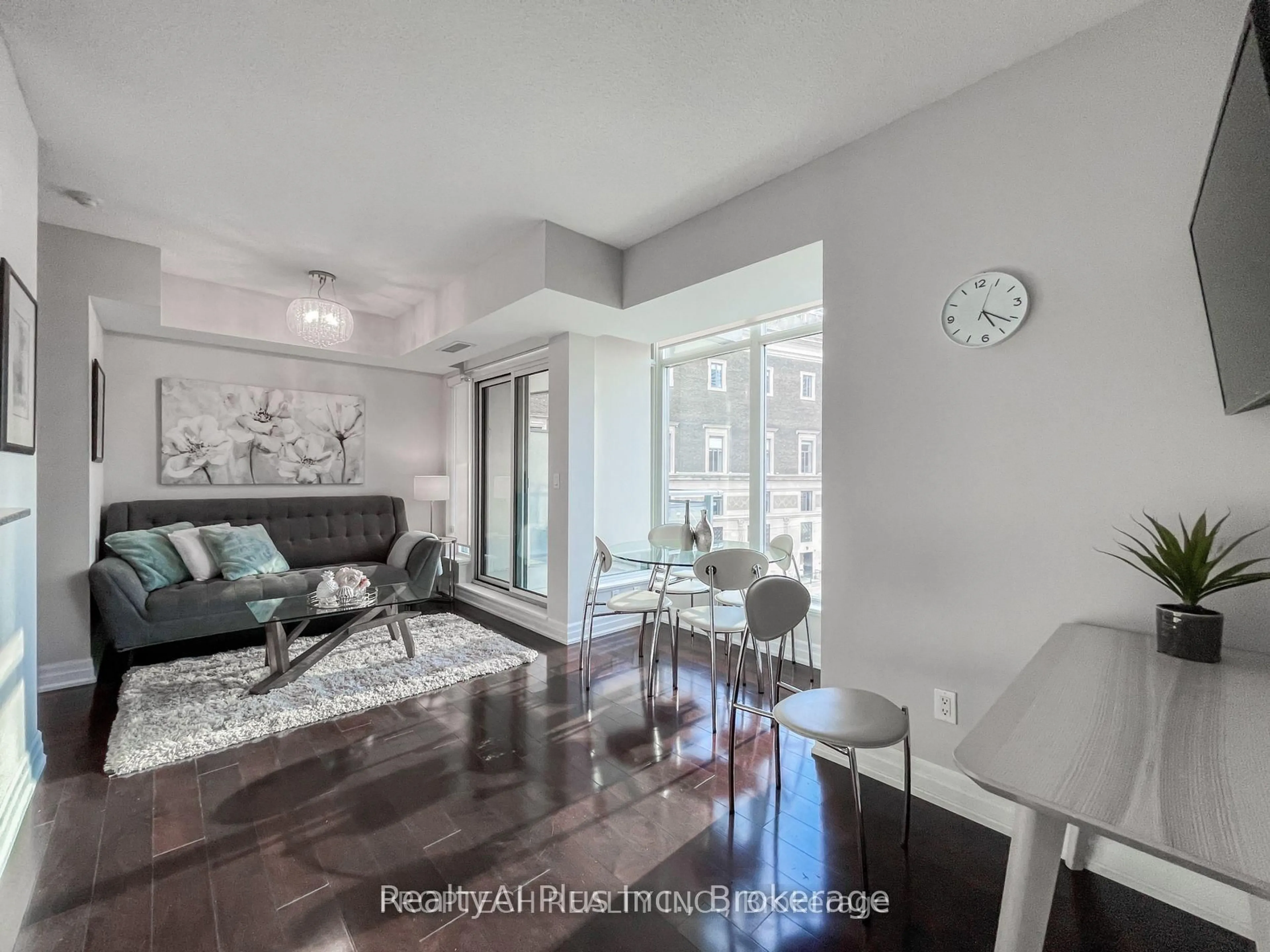 Living room with furniture, wood/laminate floor for 8 Scollard St #403, Toronto Ontario M5R 1M2
