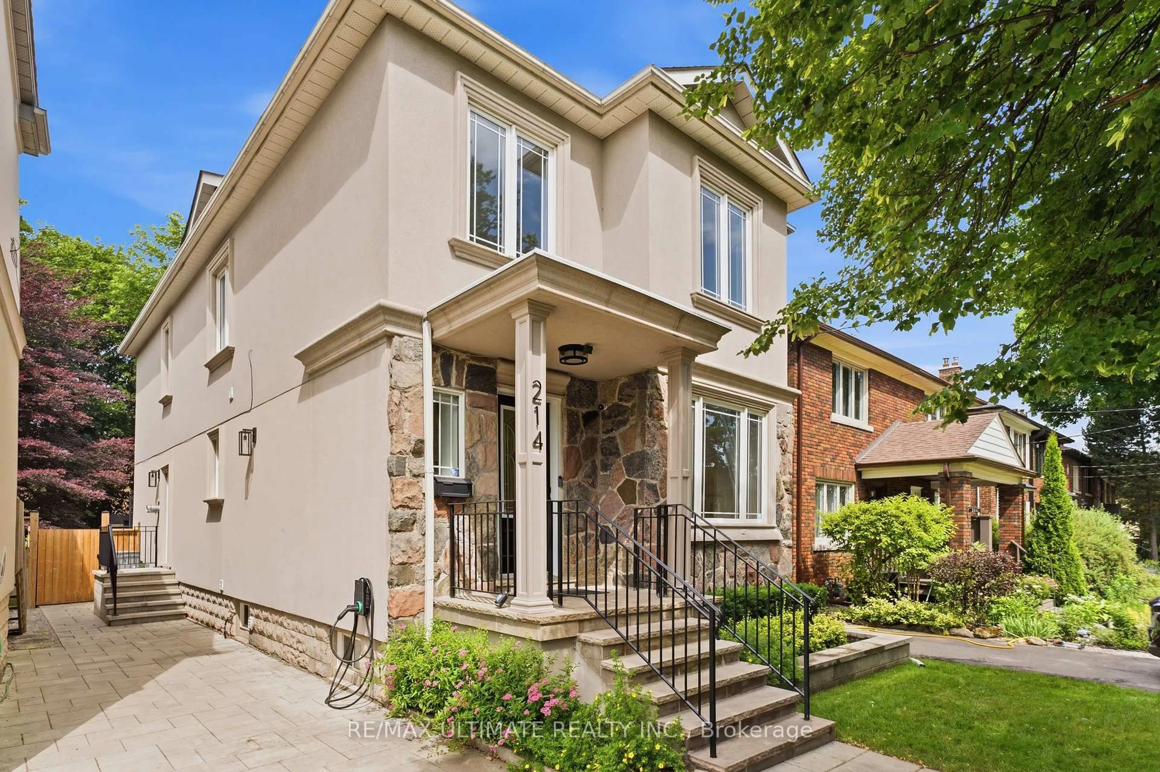 Home with brick exterior material, street for 214 Sutherland Dr, Toronto Ontario M4G 1J2
