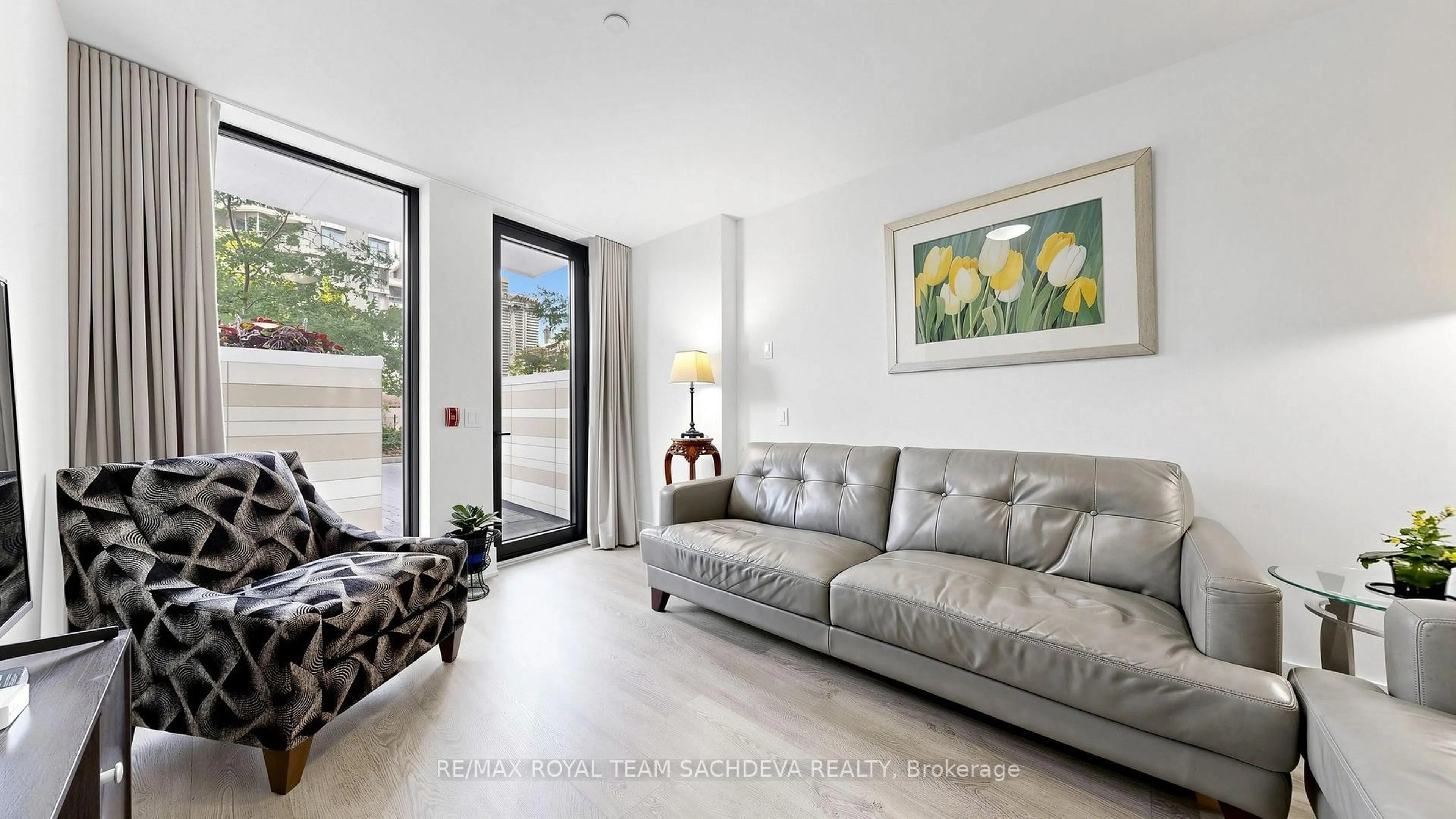 Living room with furniture, unknown for 118 MERCHANTS' WHARF #101, Toronto Ontario M5A 0L3