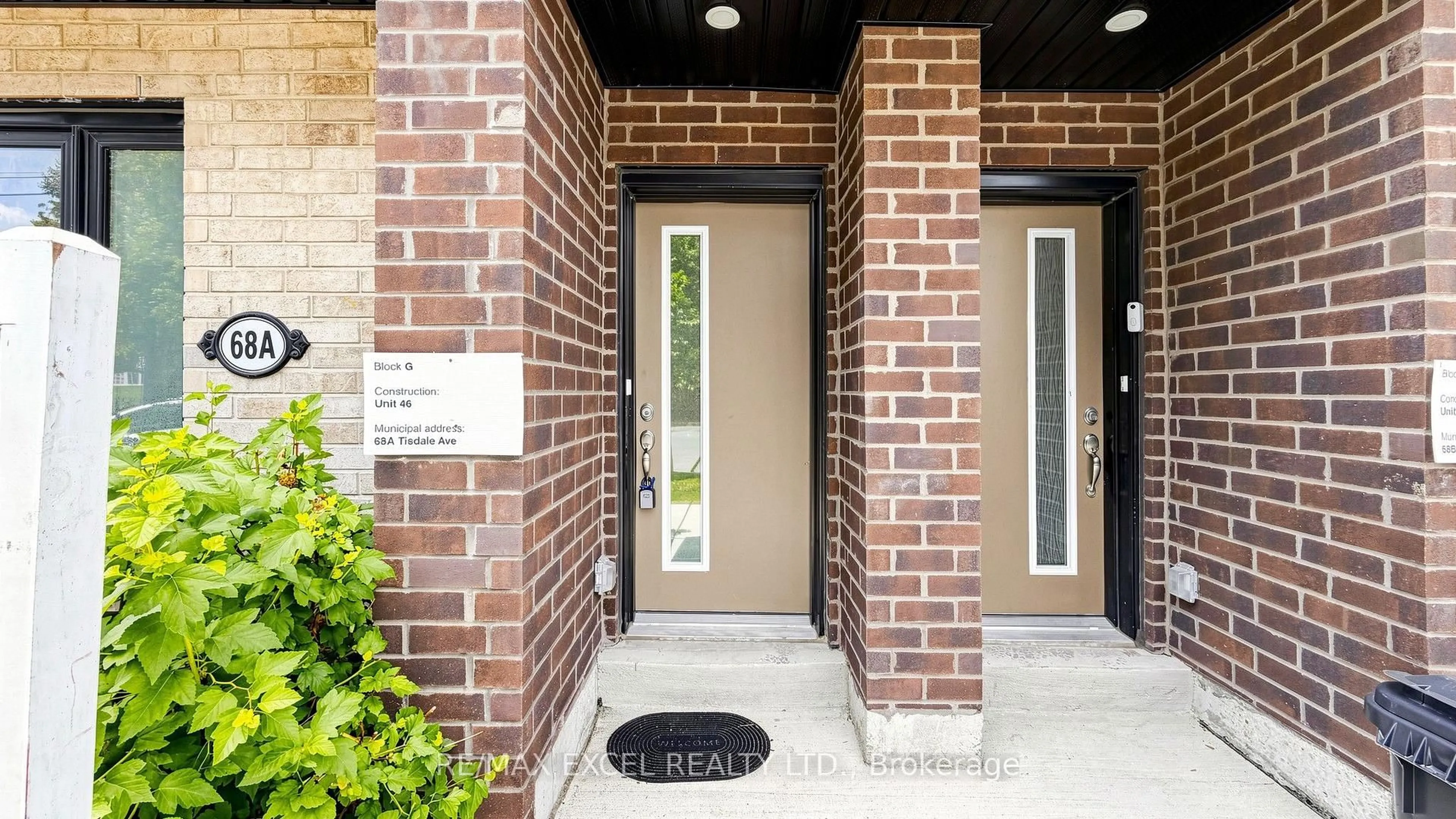 Home with brick exterior material, street for 68A Tisdale Ave, Toronto Ontario M4A 0A9
