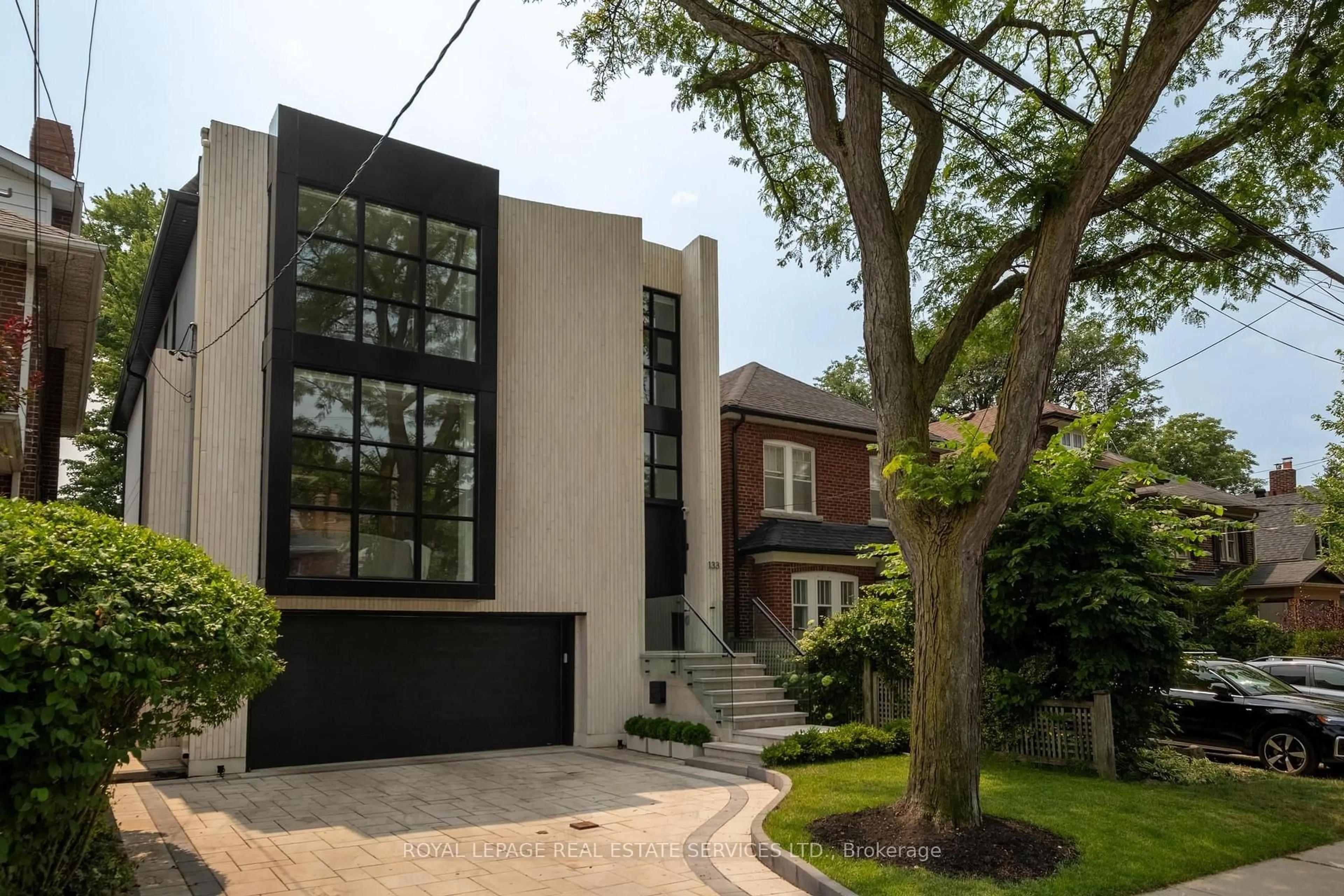 Home with brick exterior material, street for 133 Deloraine Ave, Toronto Ontario M5M 2B1
