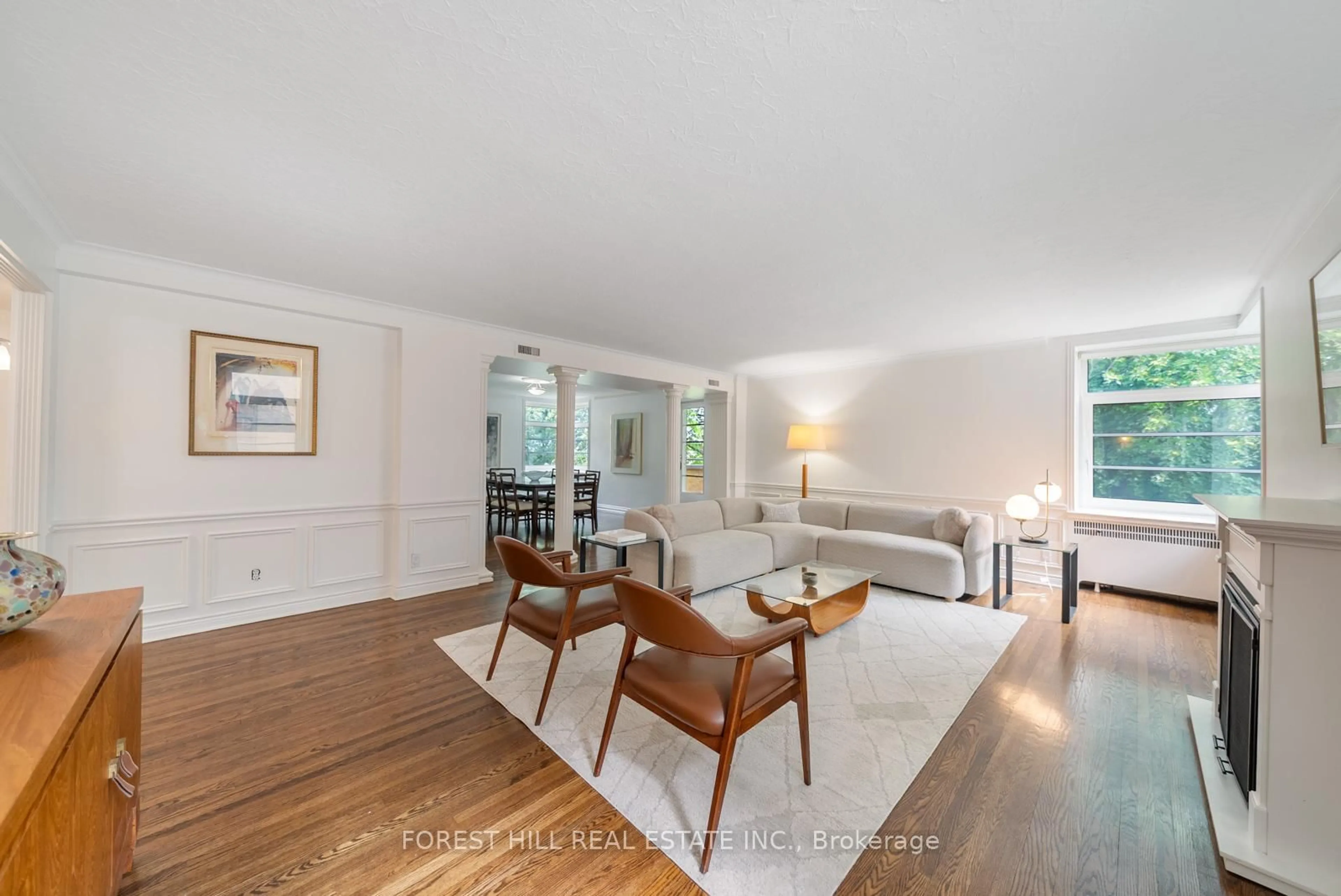 Living room with furniture, wood/laminate floor for 717 Eglinton Ave #301, Toronto Ontario M5N 1C9
