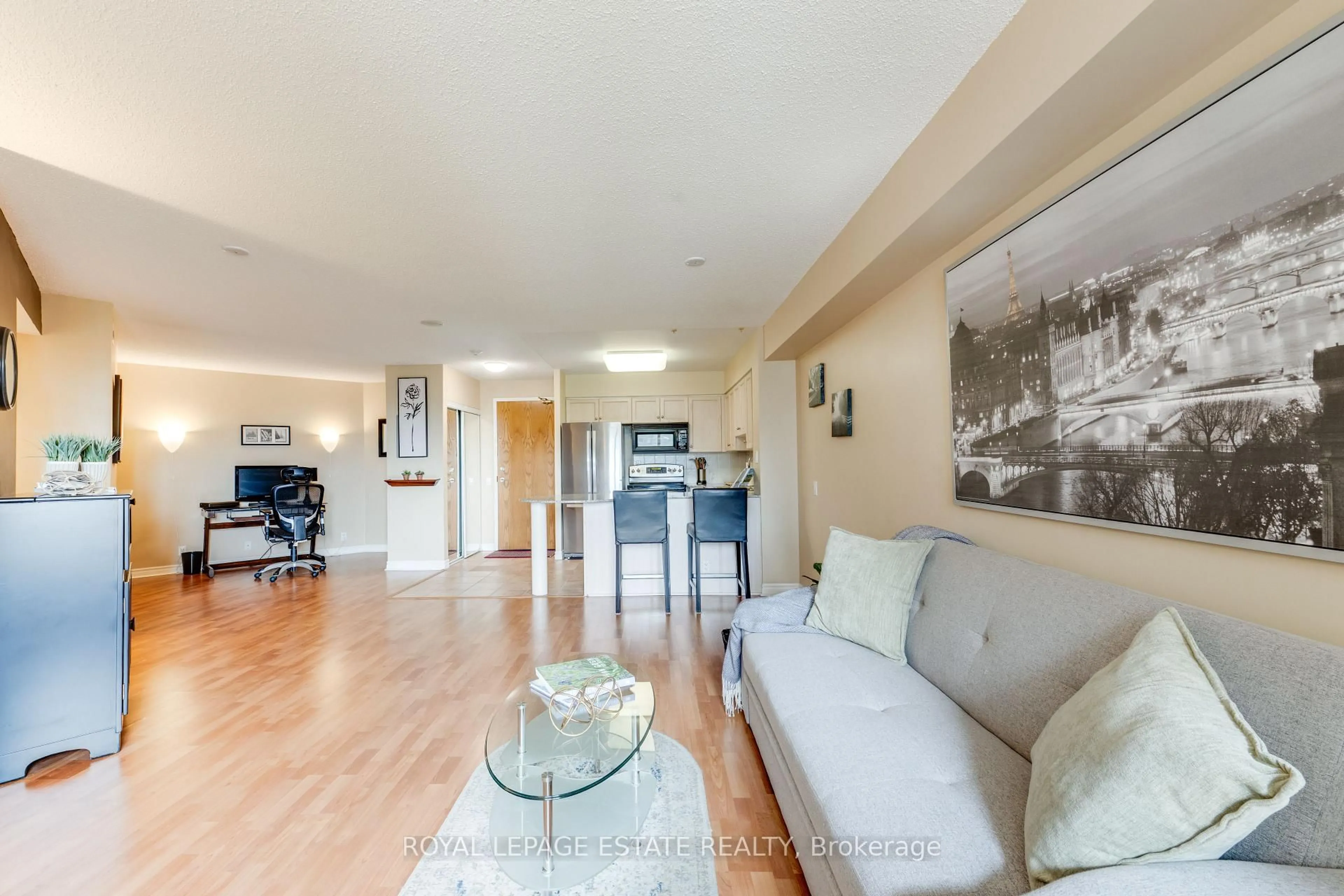 Living room with furniture, wood/laminate floor for 1720 Eglinton Ave #623, Toronto Ontario M4A 2X8