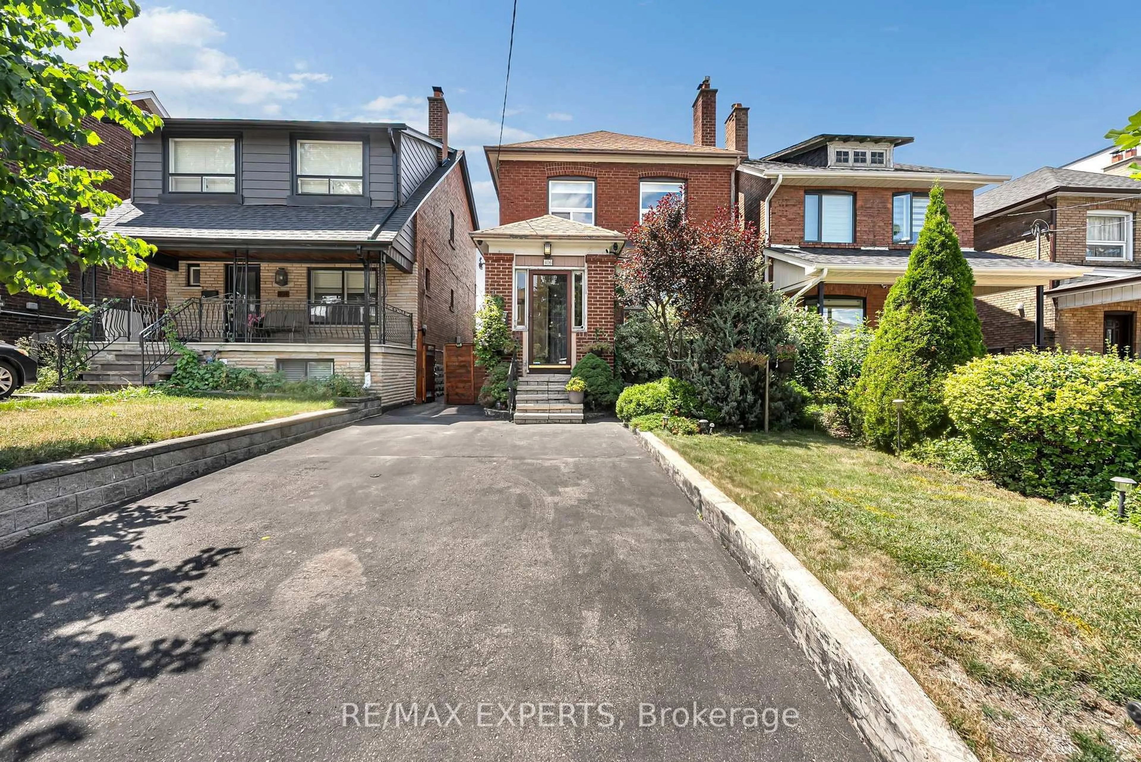Home with brick exterior material, street for 406 Lauder Ave, Toronto Ontario M6E 3J2