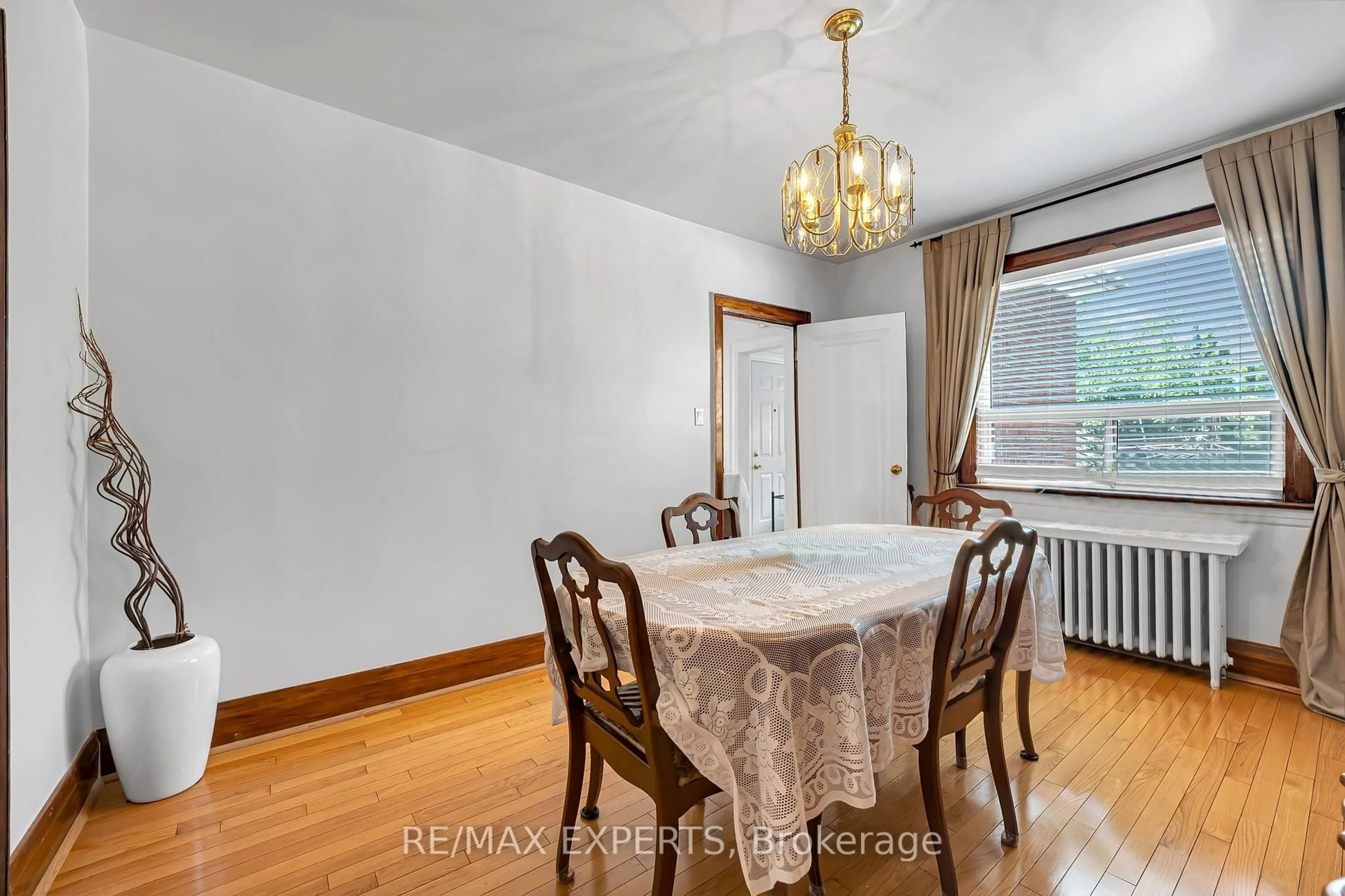 Dining room, wood/laminate floor for 406 Lauder Ave, Toronto Ontario M6E 3J2