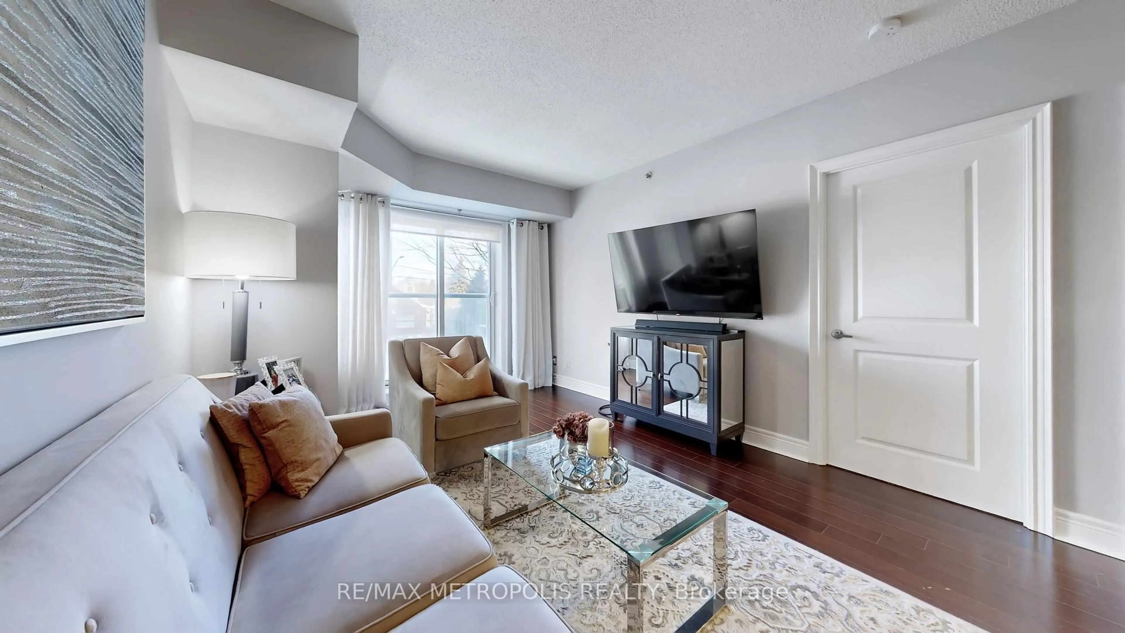 Living room with furniture, unknown for 701 Sheppard Ave #228, Toronto Ontario M3H 0B2