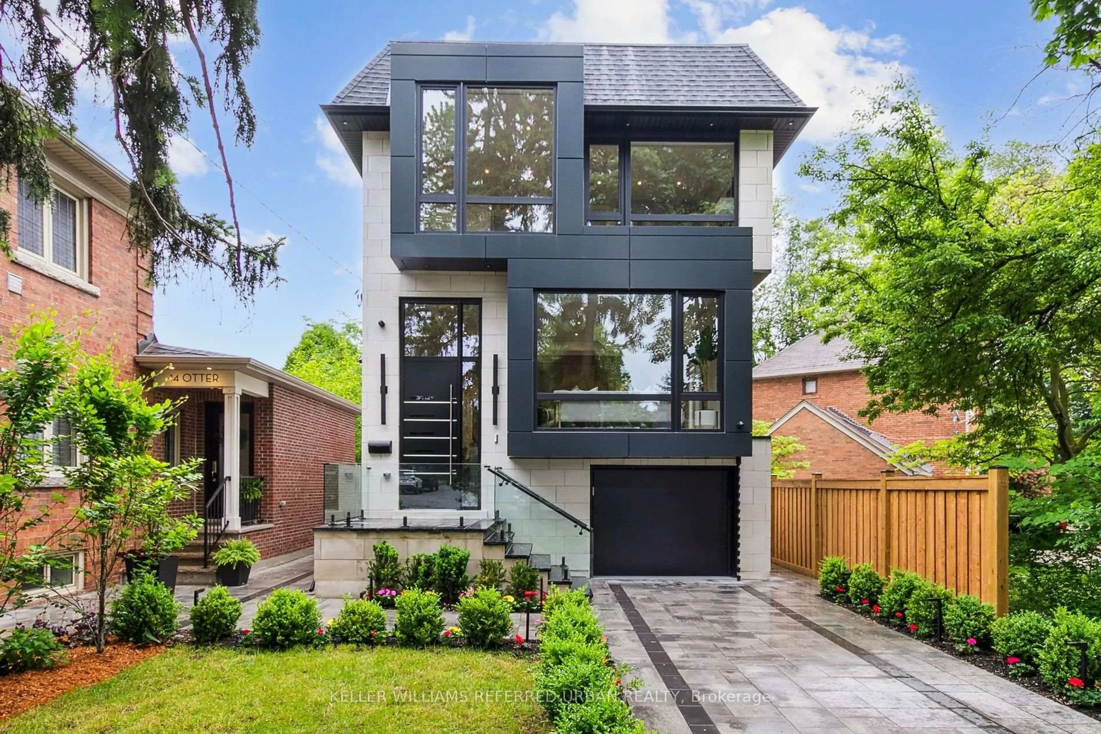 Home with brick exterior material, street for 12 Otter Cres, Toronto Ontario M5N 2W2