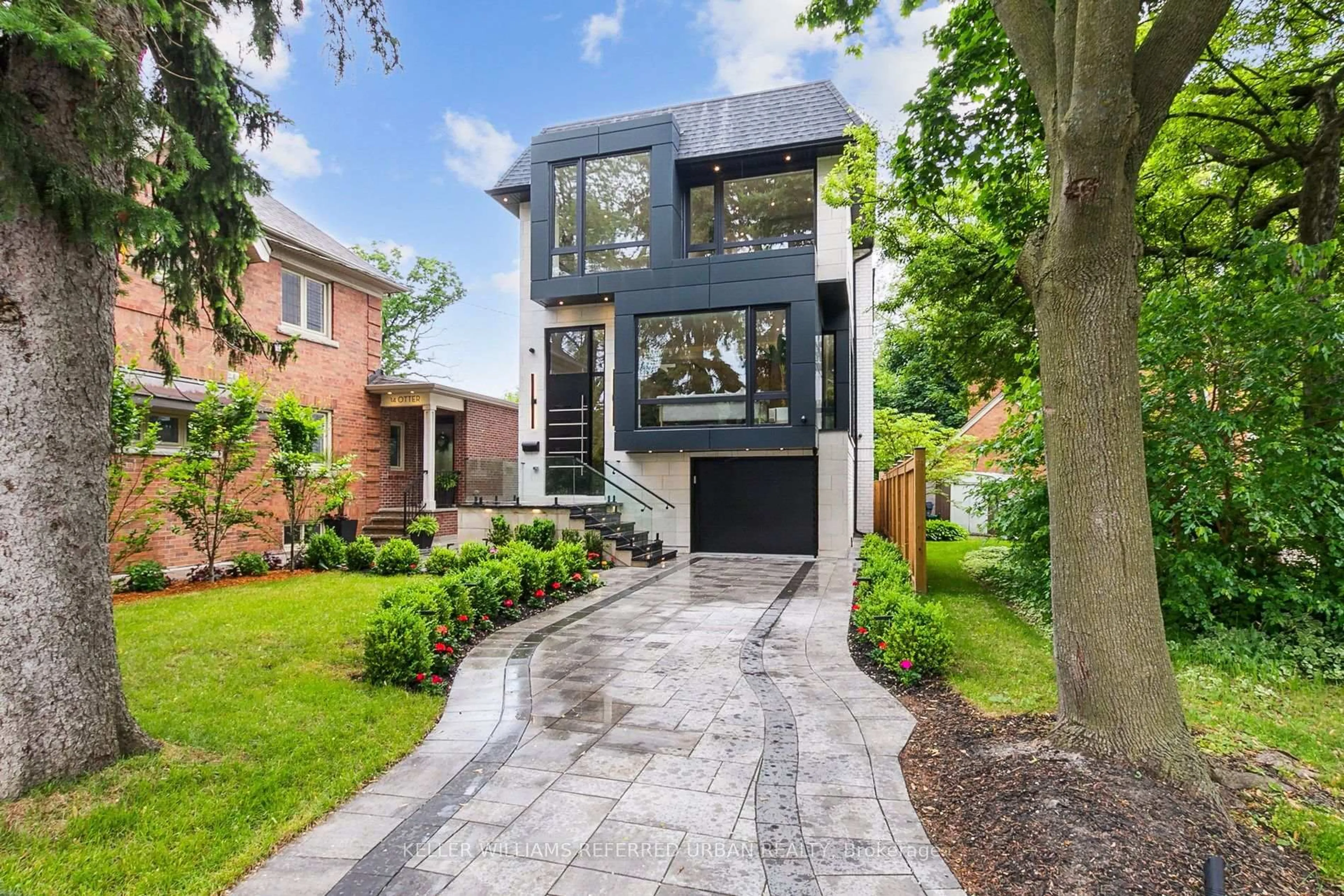 Home with brick exterior material, street for 12 Otter Cres, Toronto Ontario M5N 2W2