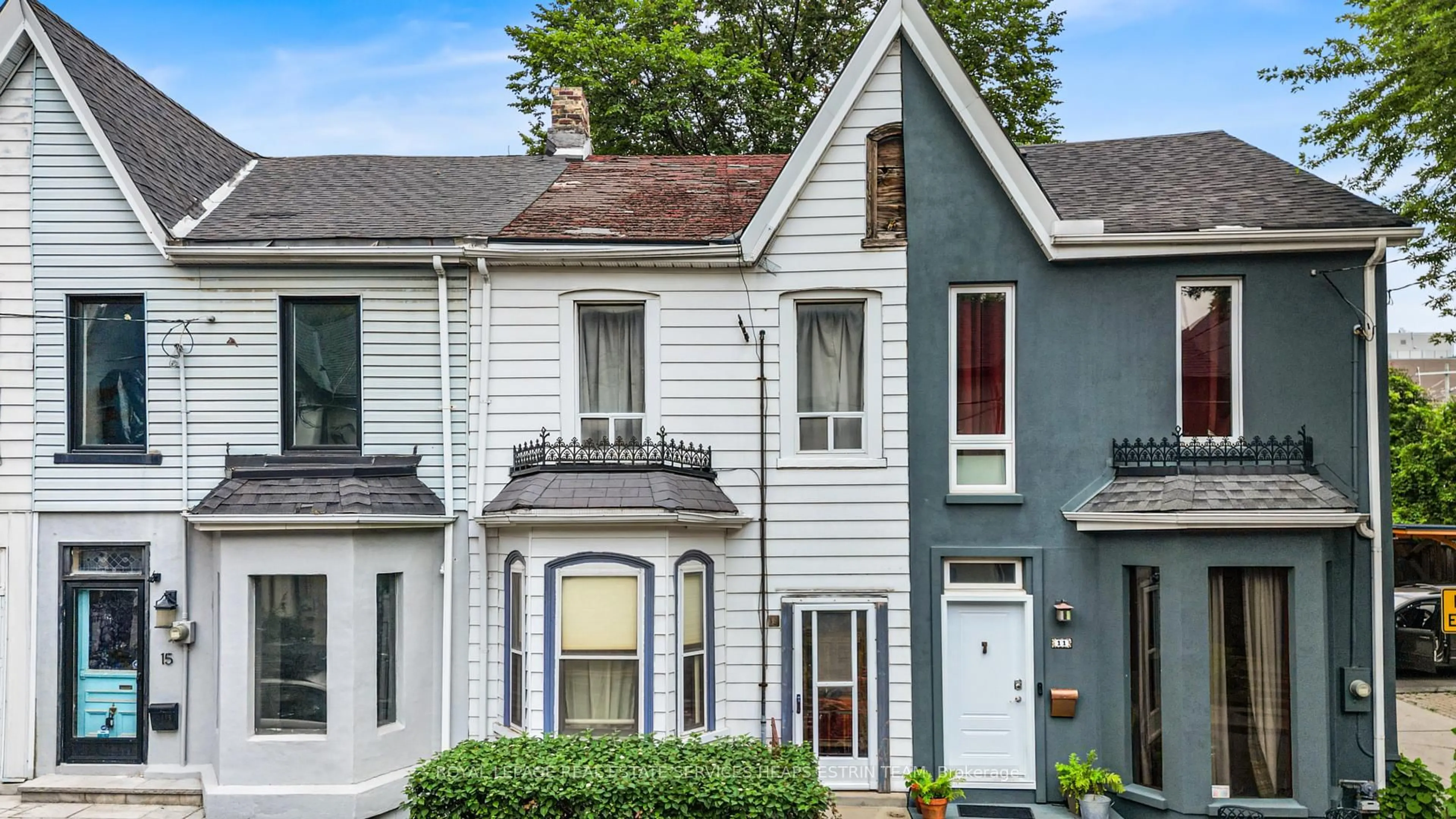 Home with vinyl exterior material, street for 13 Bright St, Toronto Ontario M5A 3H5