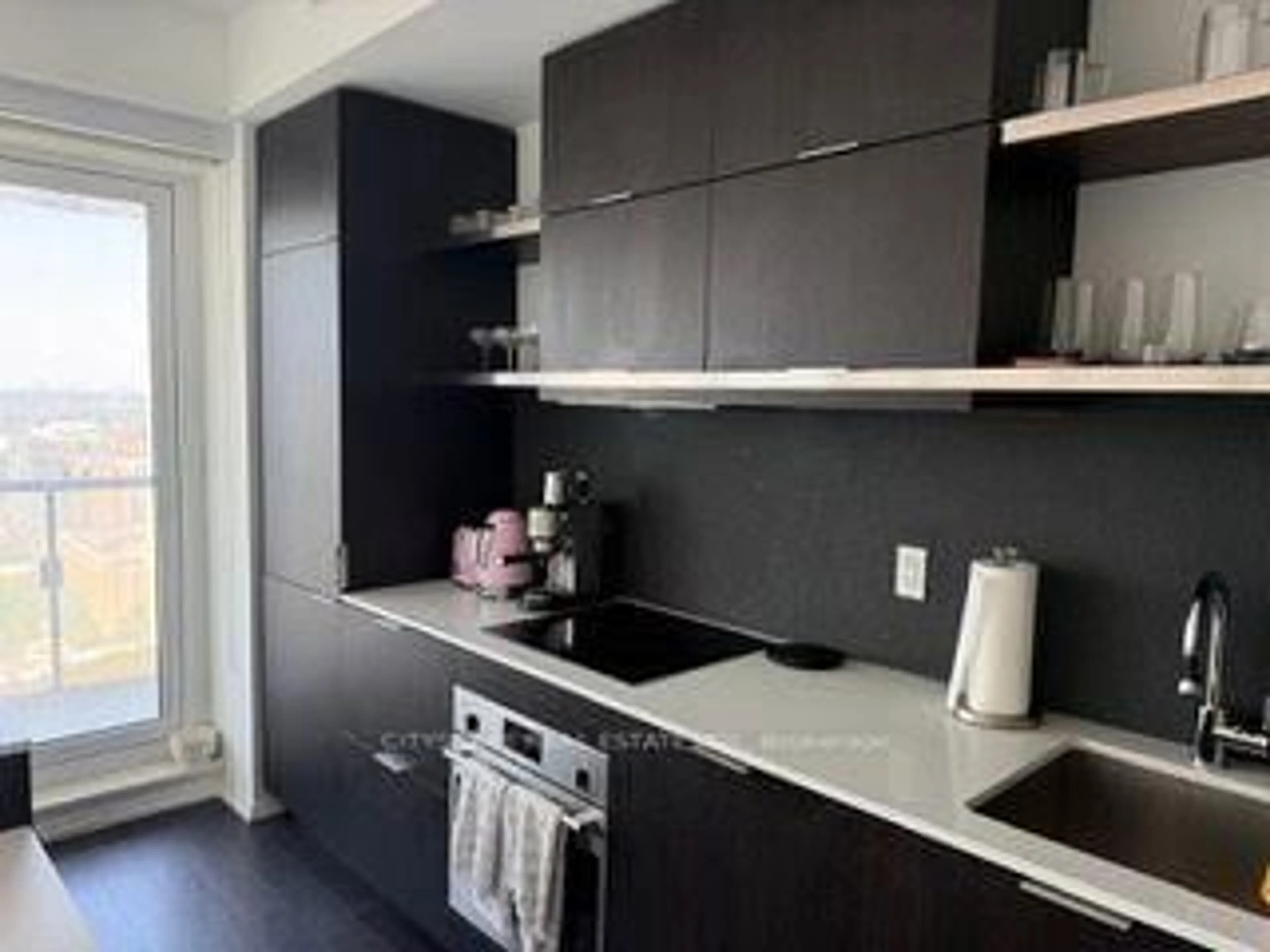 Standard kitchen, wood/laminate floor for 197 Yonge St #35, Toronto Ontario M5B 0C1