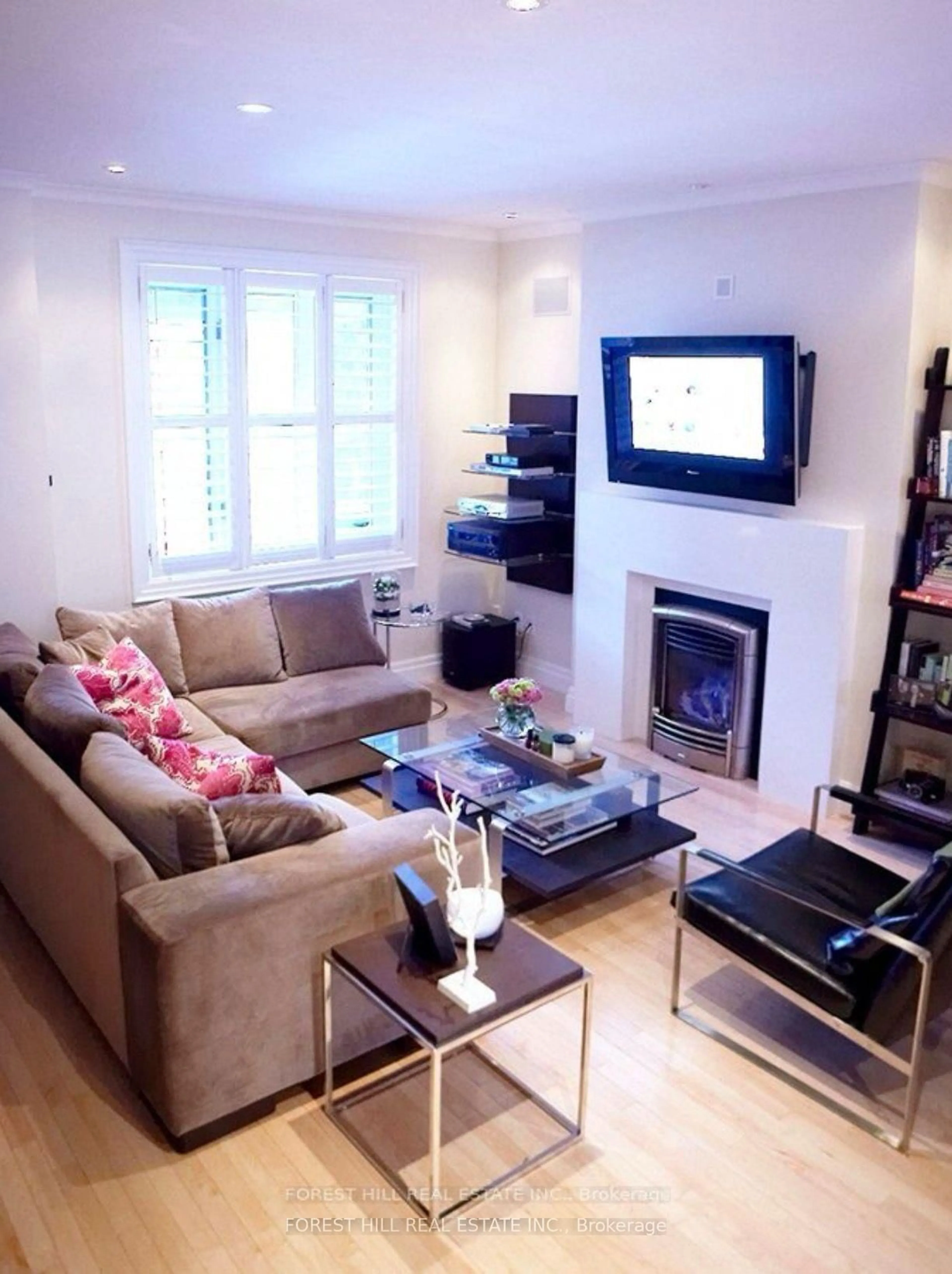 Living room with furniture, wood/laminate floor for 123 Helendale Ave, Toronto Ontario M4R 1C6