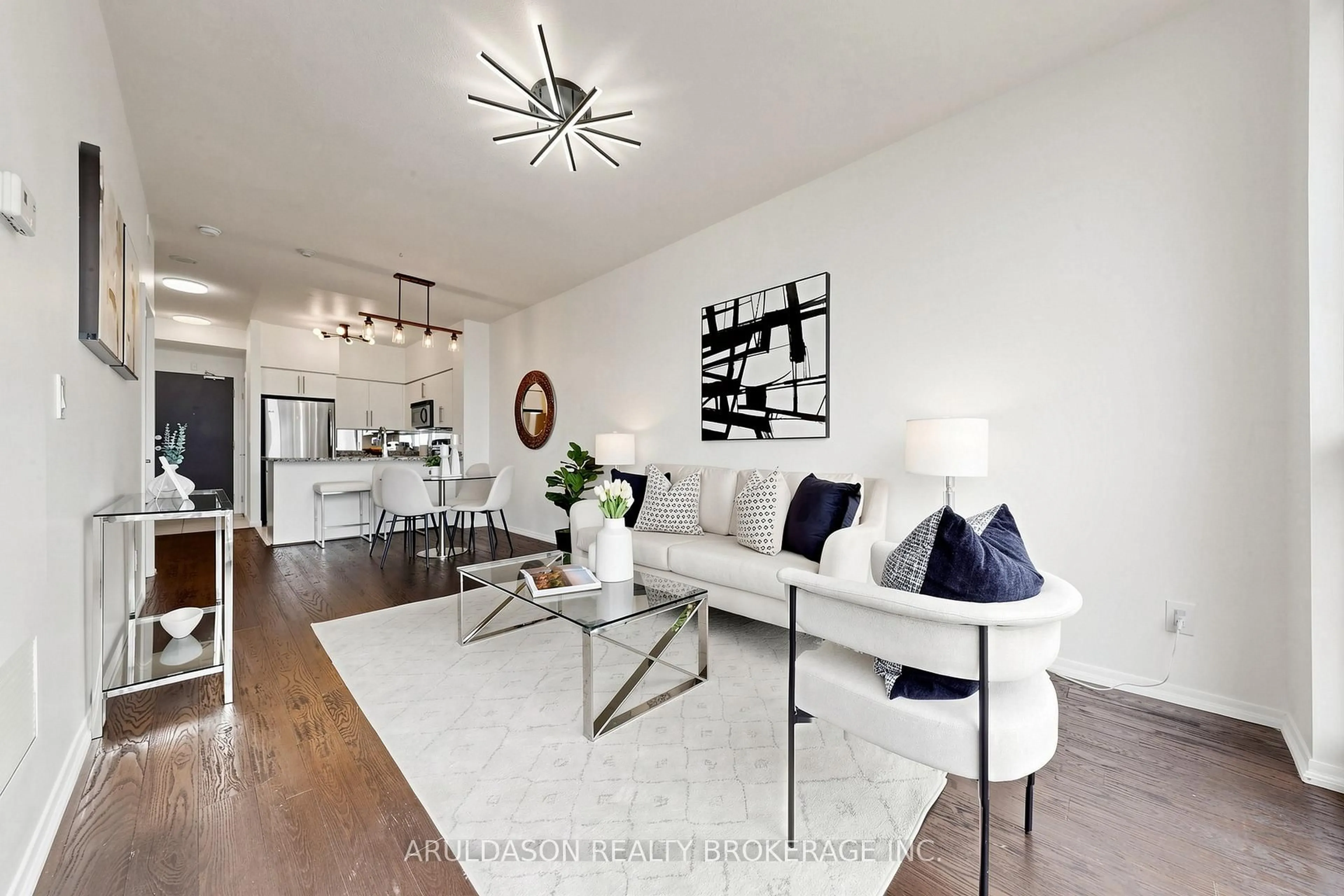 Living room with furniture, wood/laminate floor for 231 Fort York Blvd #2007, Toronto Ontario M5V 1B2
