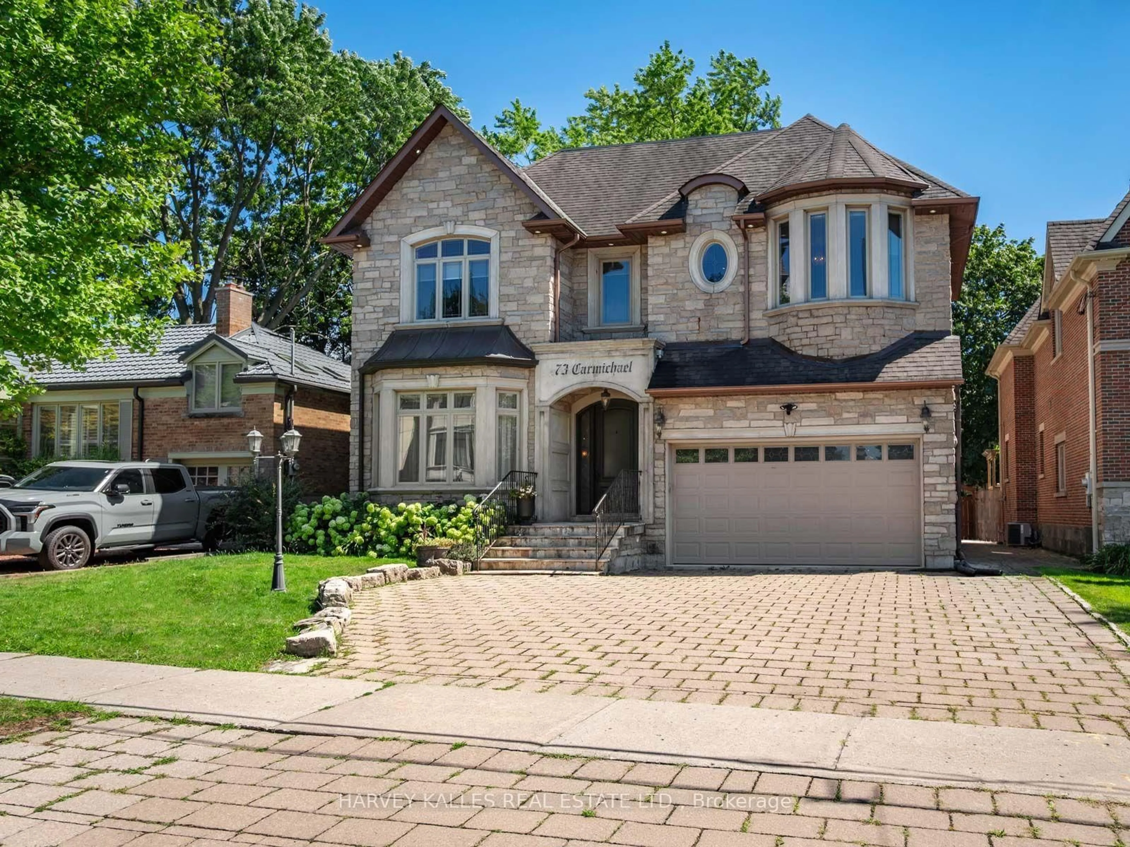 Home with brick exterior material, street for 73 Carmichael Ave, Toronto Ontario M5M 2W8