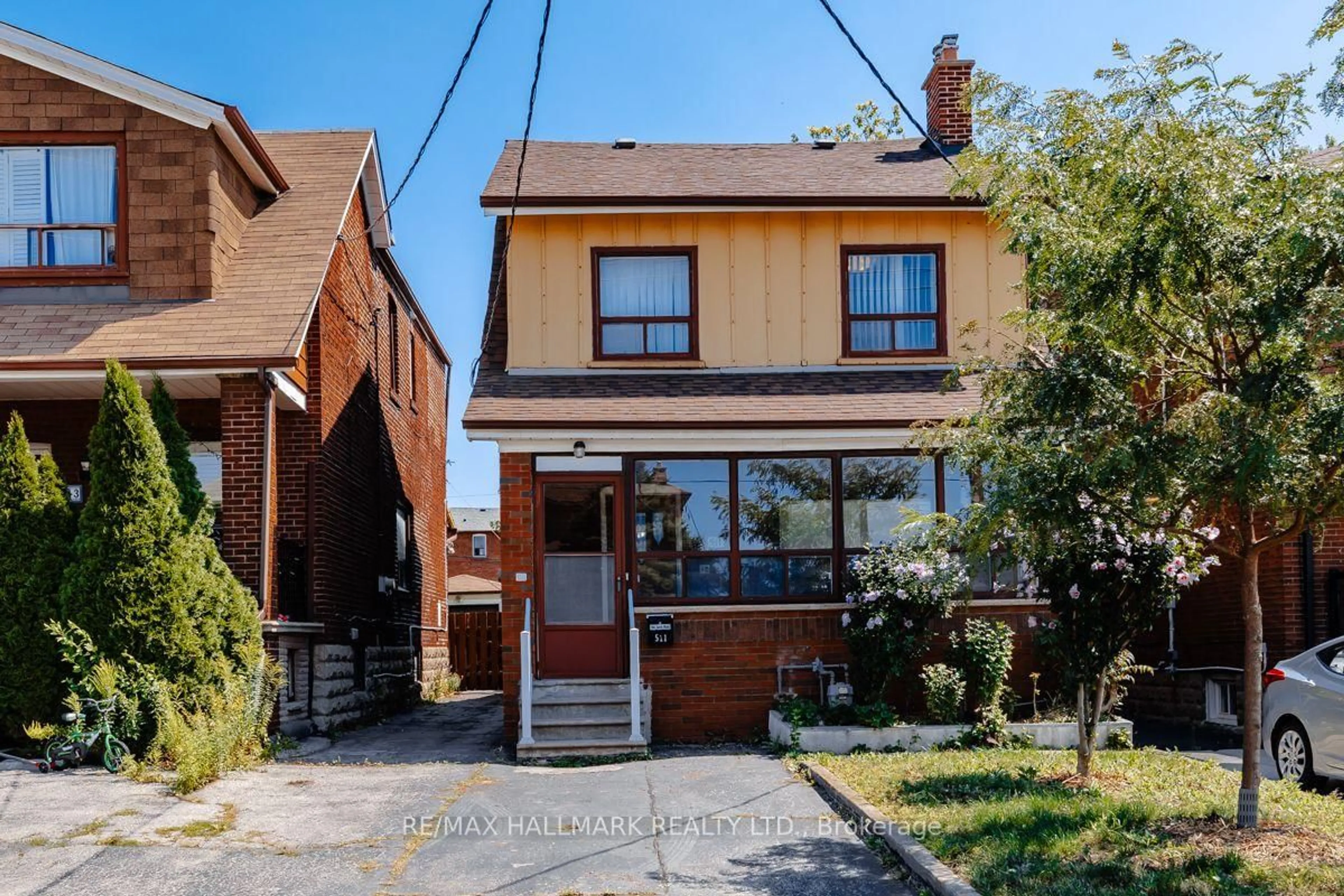 Home with brick exterior material, street for 511 Northcliffe Blvd, Toronto Ontario M6E 3L4