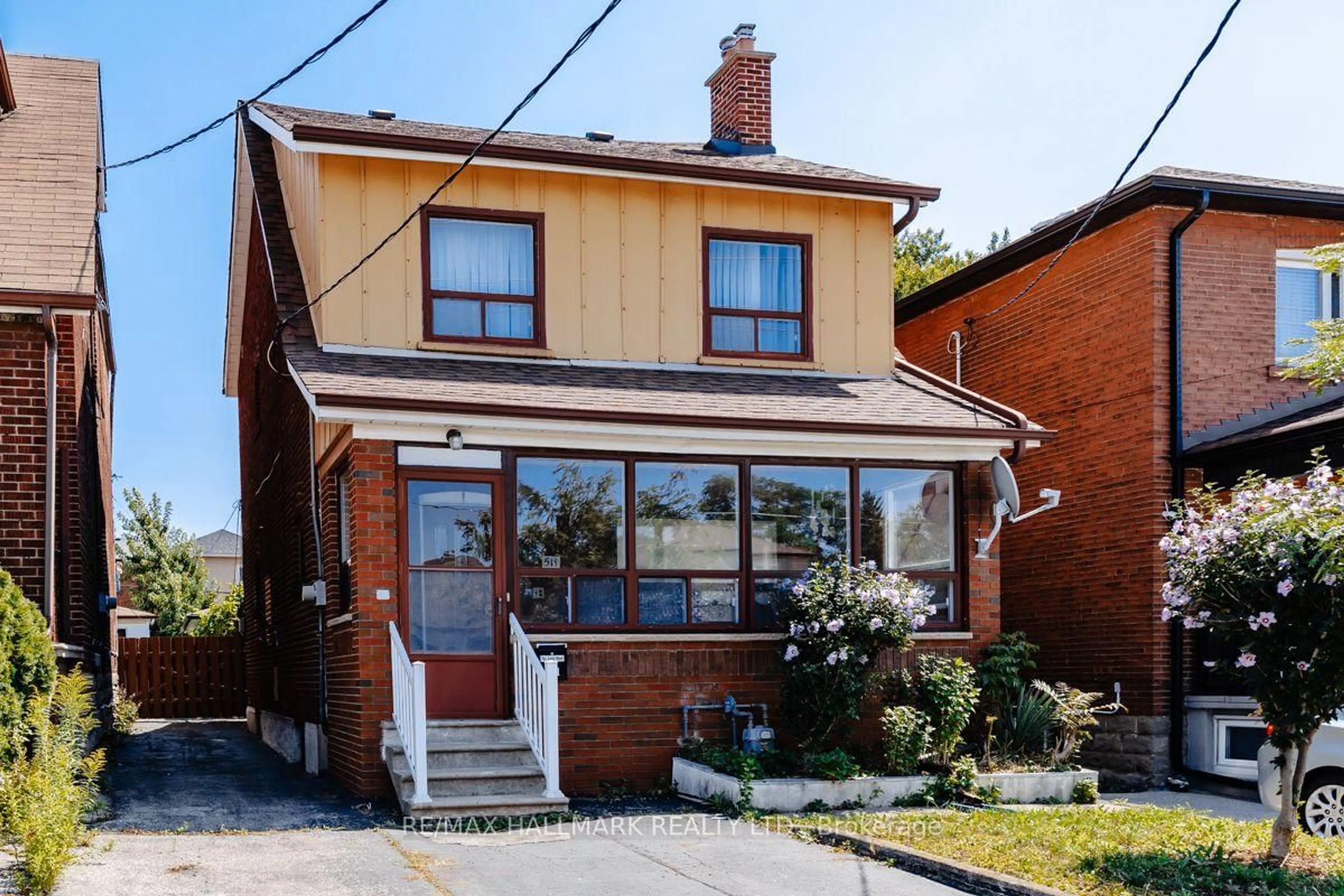 Home with brick exterior material, street for 511 Northcliffe Blvd, Toronto Ontario M6E 3L4
