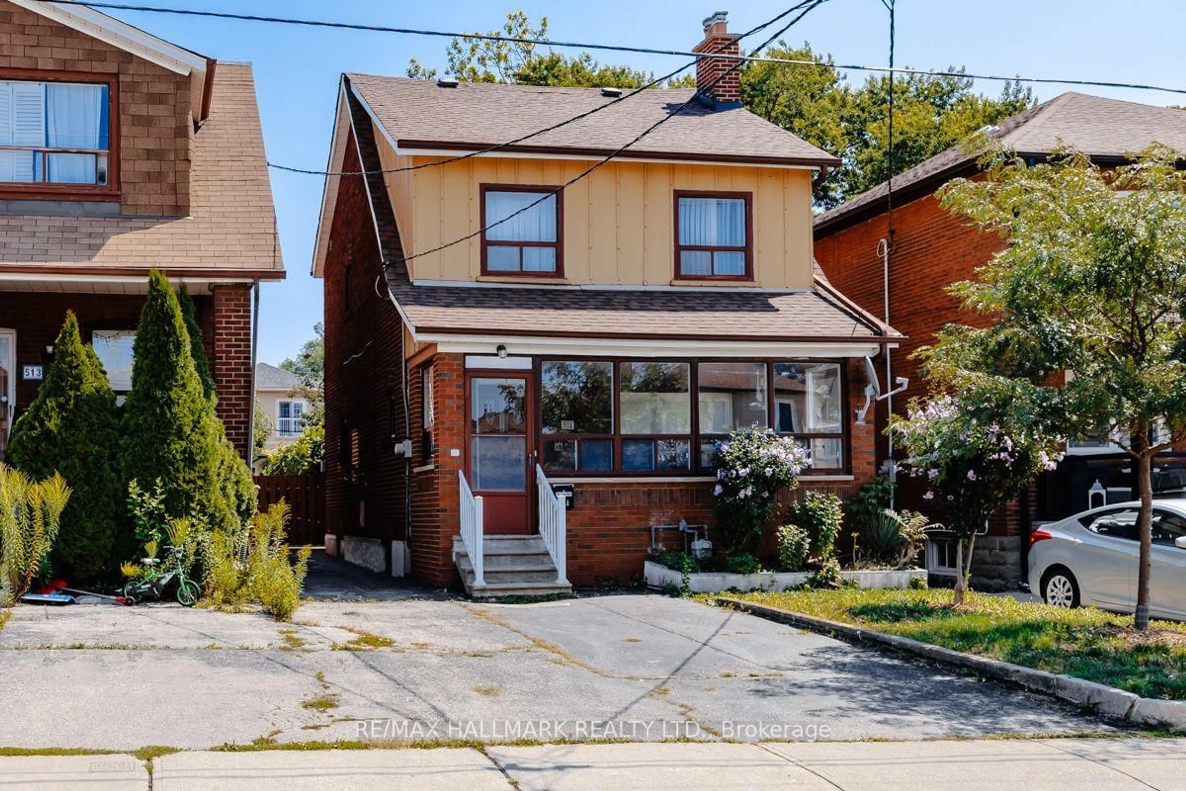 Home with brick exterior material, street for 511 Northcliffe Blvd, Toronto Ontario M6E 3L4