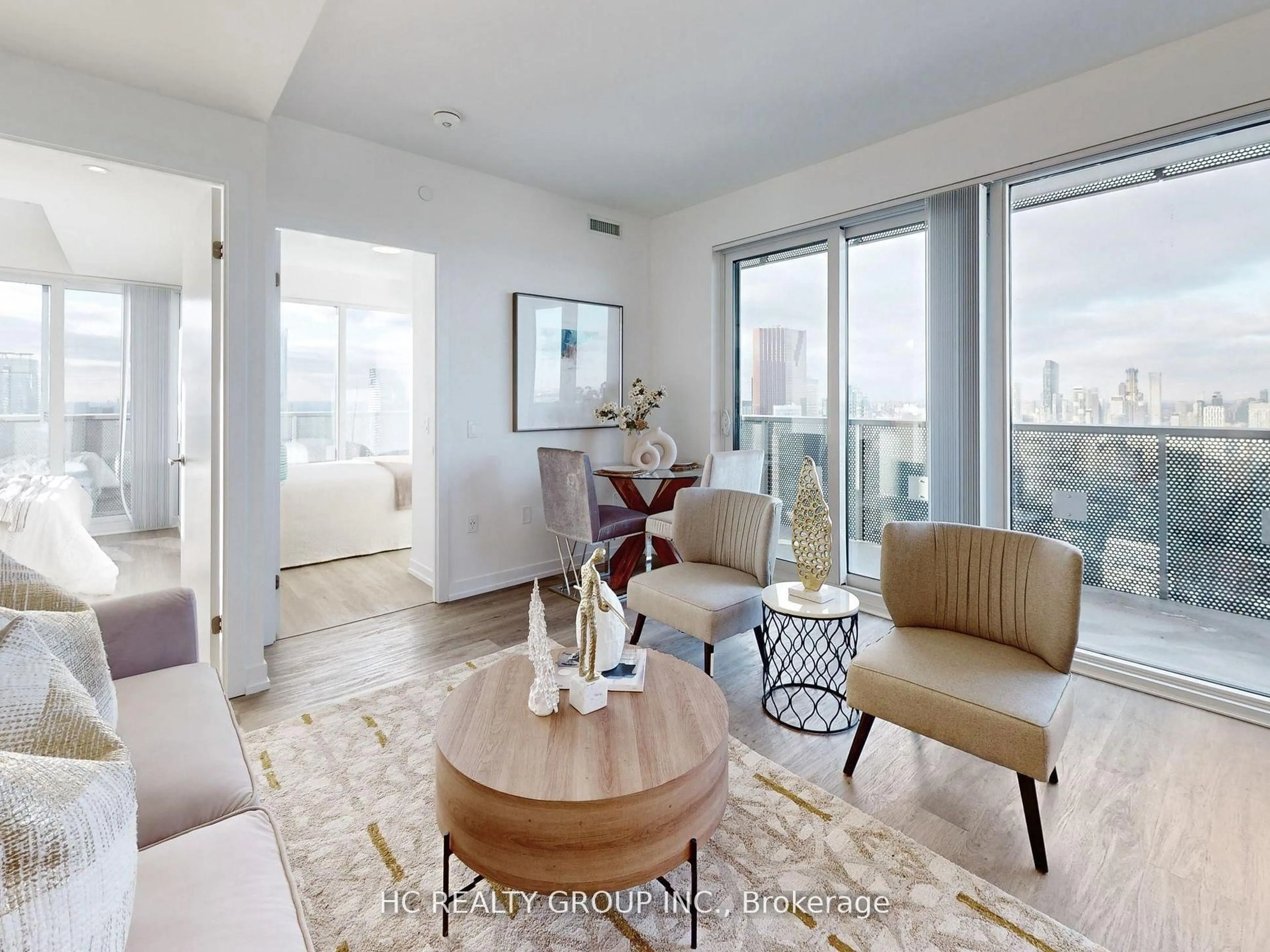 Living room with furniture, unknown for 55 Cooper St #6901, Toronto Ontario M5E 0G1