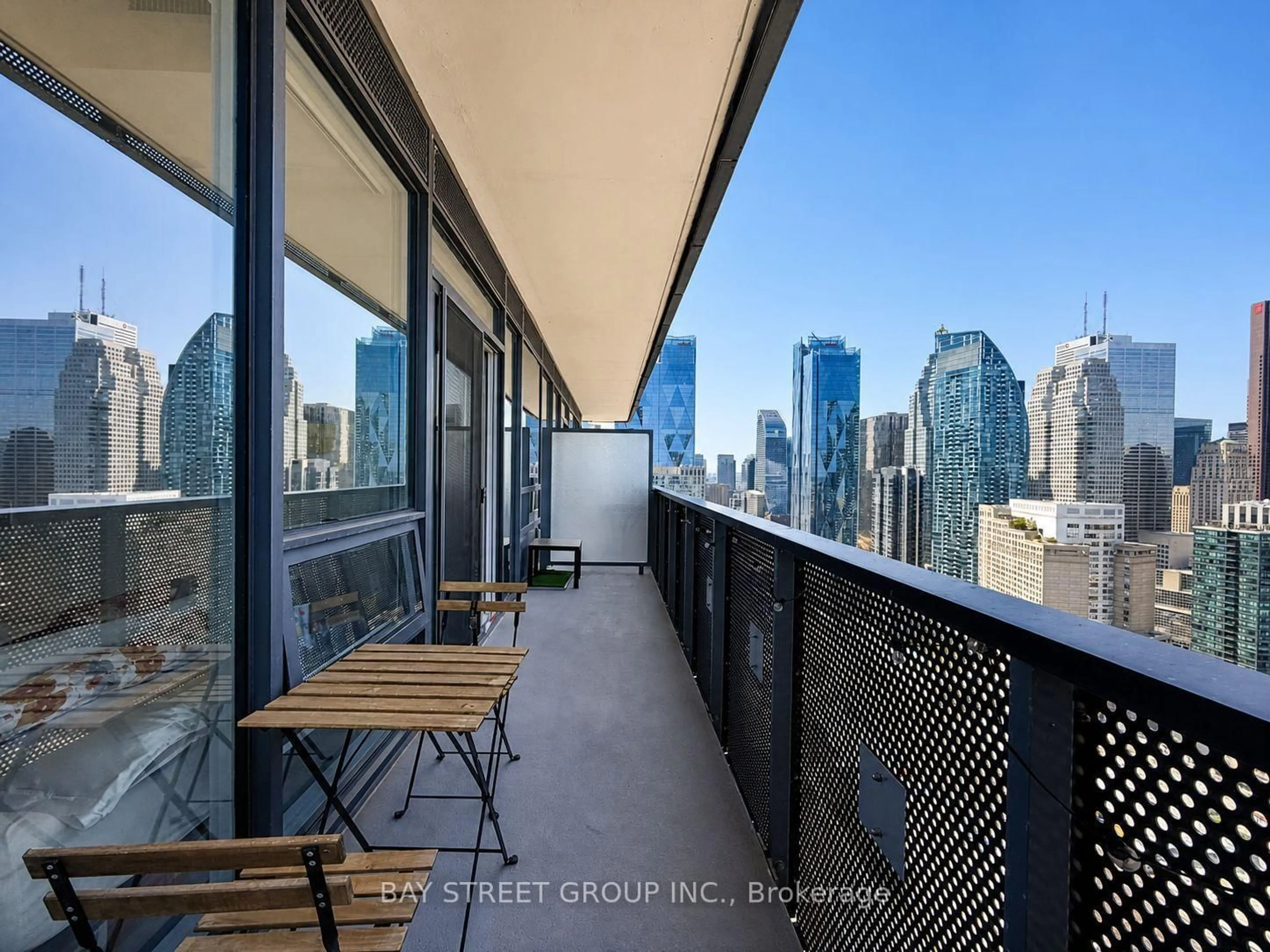 Balcony in the apartment, city buildings view from balcony for 55 cooper St #4102, Toronto Ontario M5E 0G1