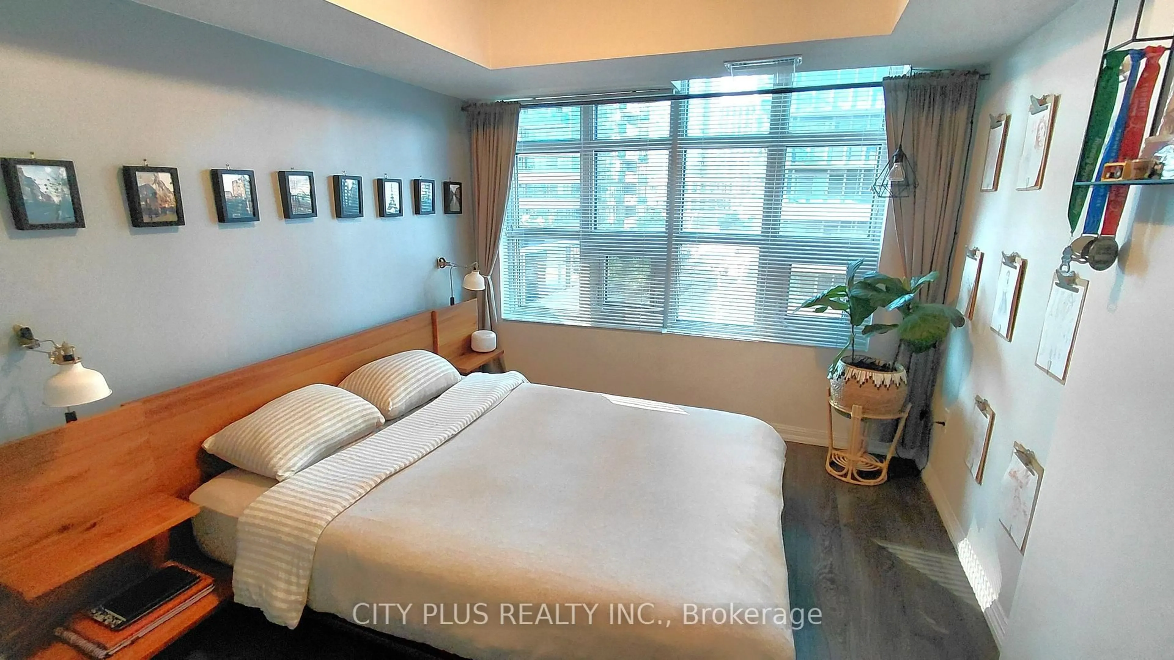 Bedroom with bed, wood/laminate floor for 85 East Liberty St #530, Toronto Ontario M6K 3R4