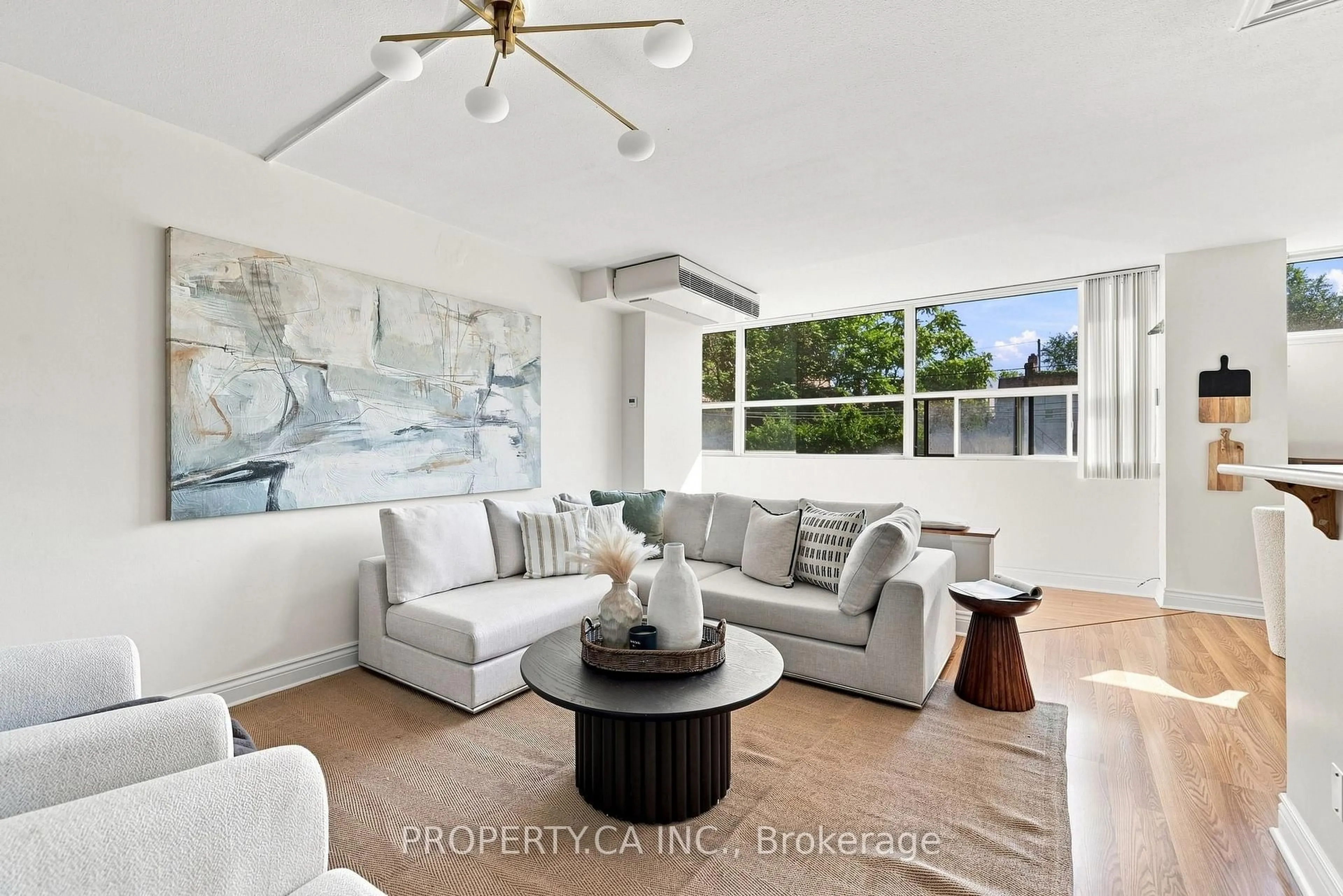 Living room with furniture, ceramic/tile floor for 60 Montclair Ave #202, Toronto Ontario M5P 1P7