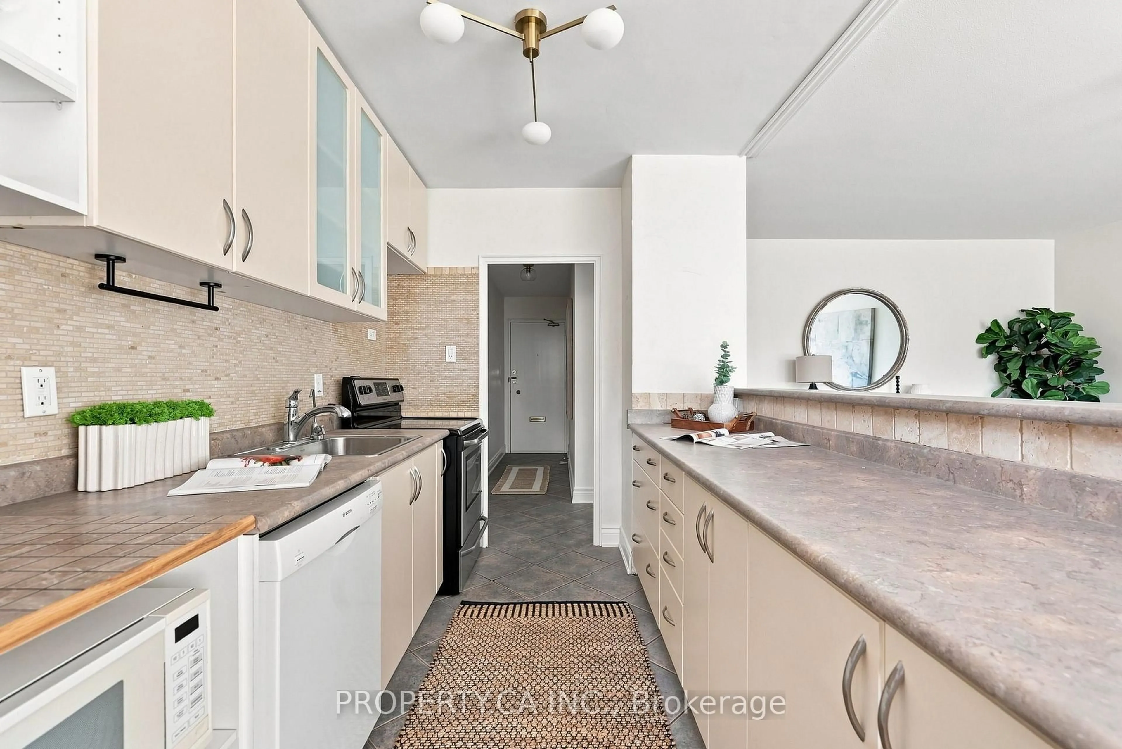 Standard kitchen, ceramic/tile floor for 60 Montclair Ave #202, Toronto Ontario M5P 1P7