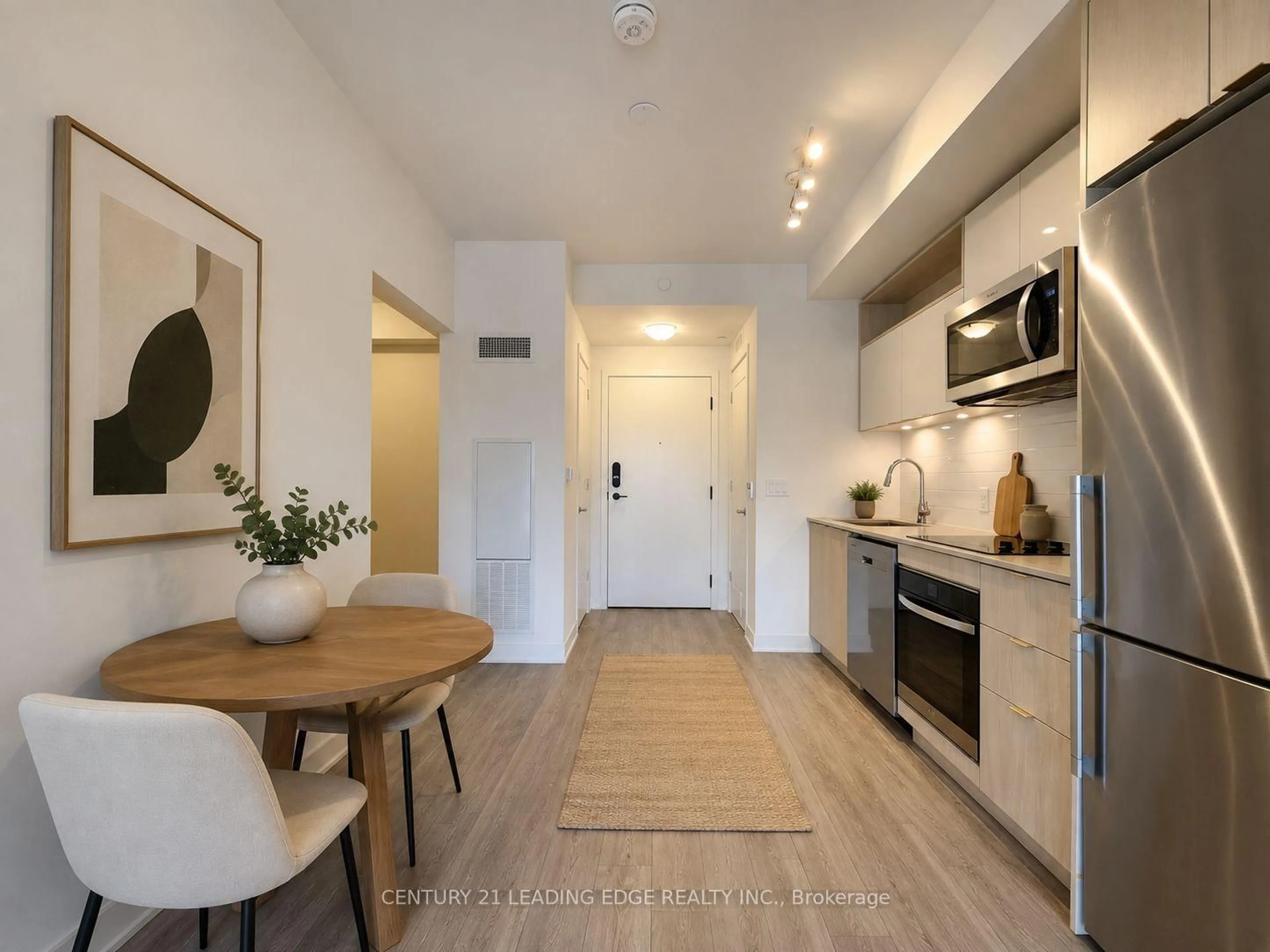 Open concept kitchen, wood/laminate floor for 135 Lower Sherbourne St #565, Toronto Ontario M5A 1Y4