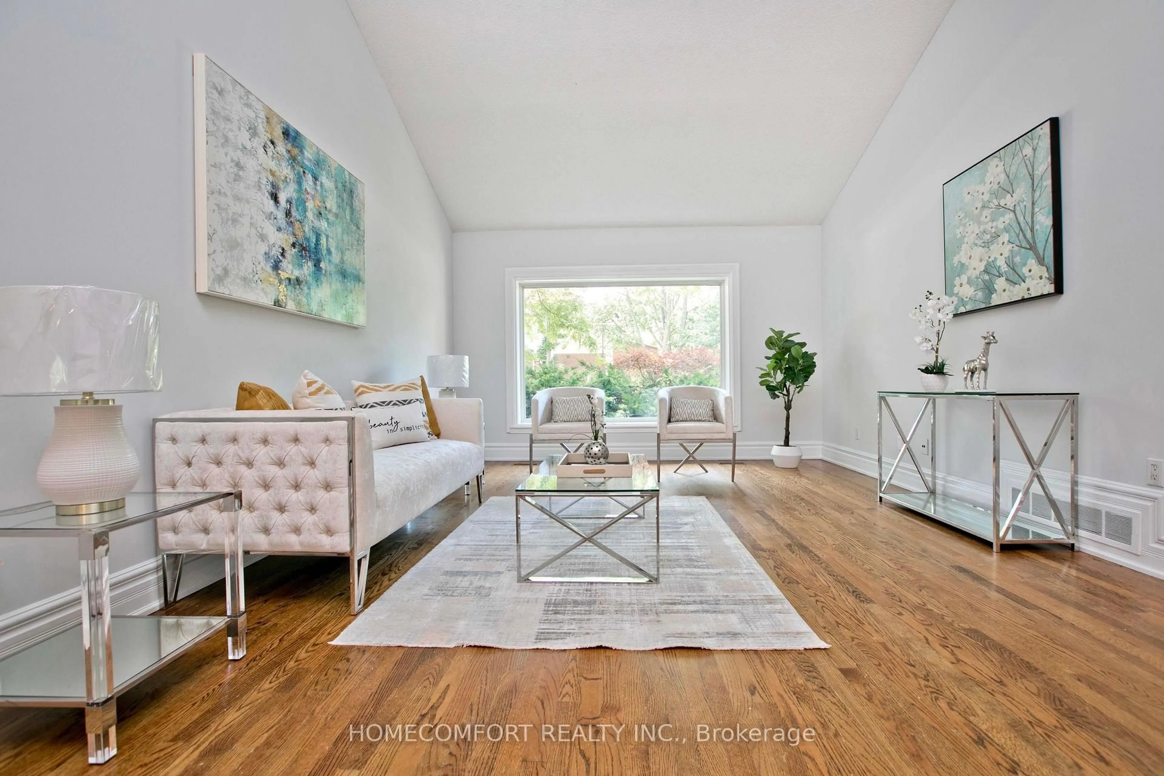 Living room with furniture, wood/laminate floor for 17 Bramble Dr, Toronto Ontario M3B 2E9