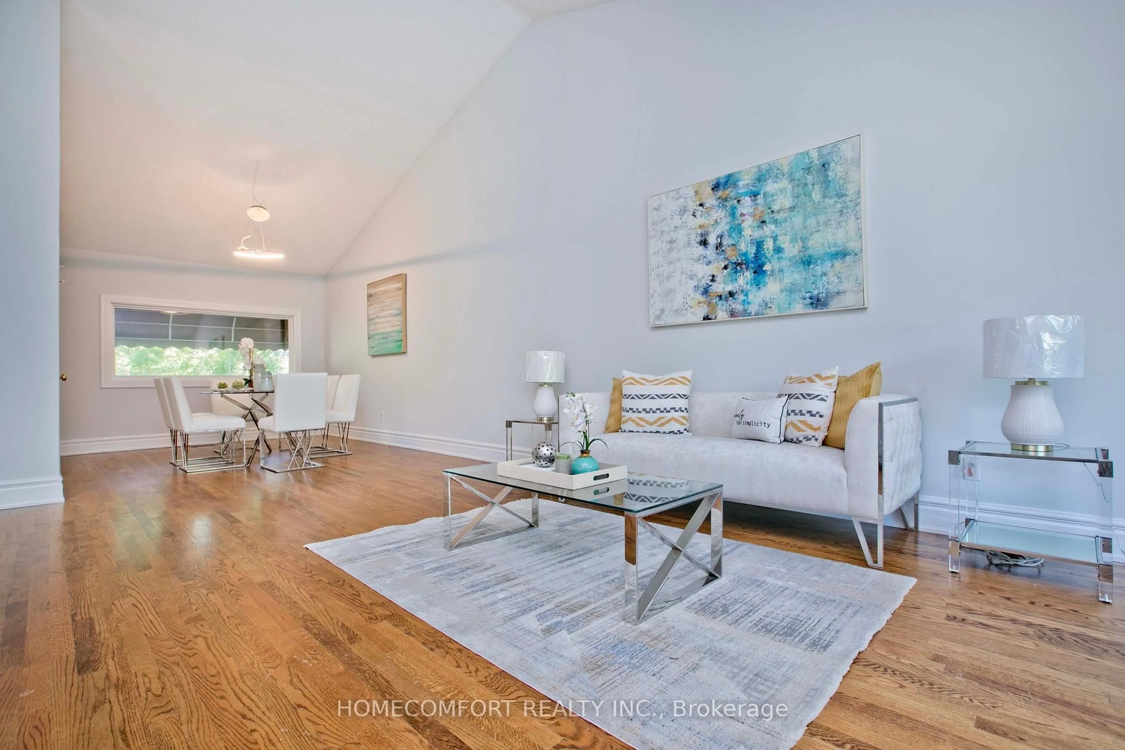 Living room with furniture, wood/laminate floor for 17 Bramble Dr, Toronto Ontario M3B 2E9