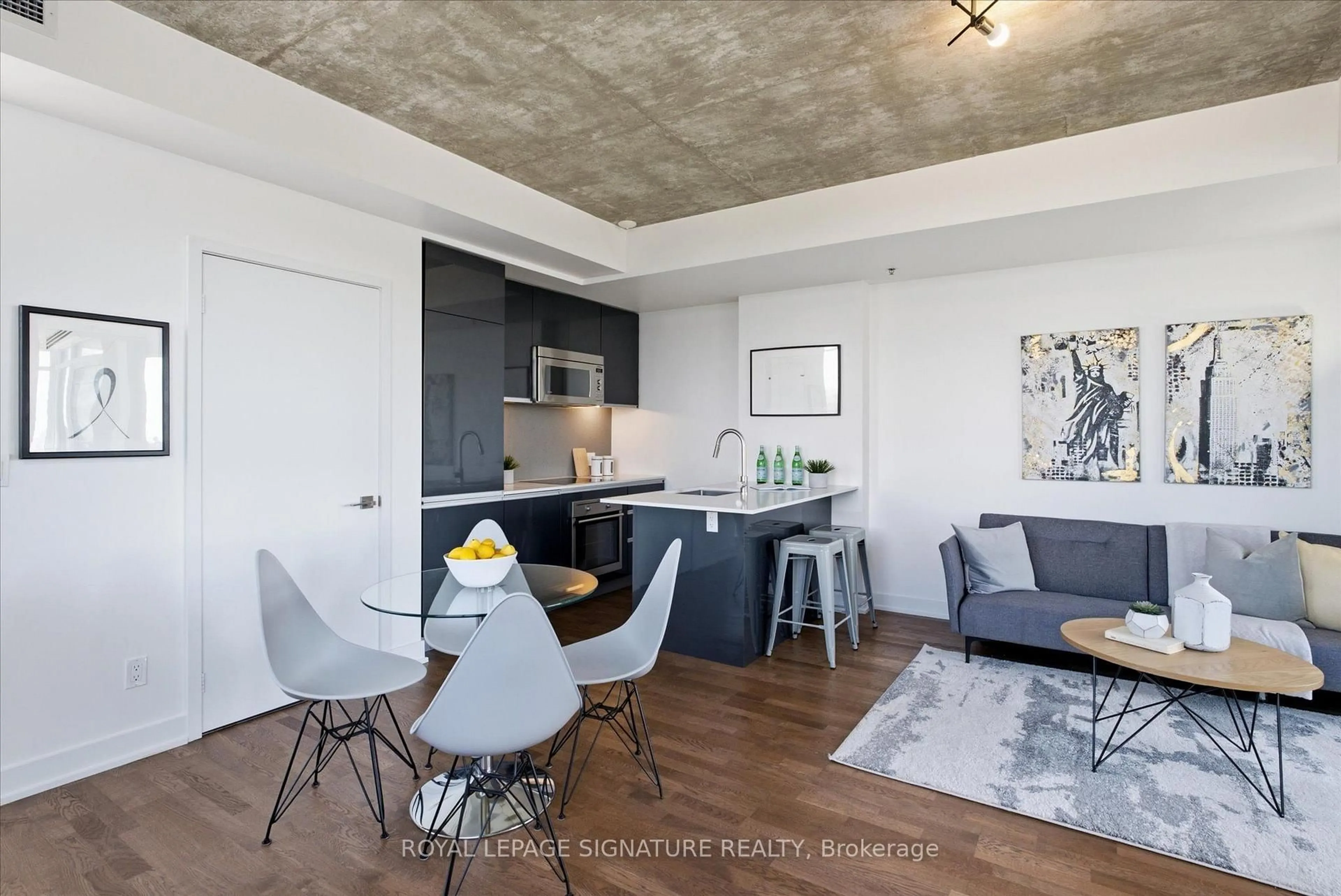 Open concept kitchen, cement floor for 20 Minowan Miikan Lane #921, Toronto Ontario M6J 0E5